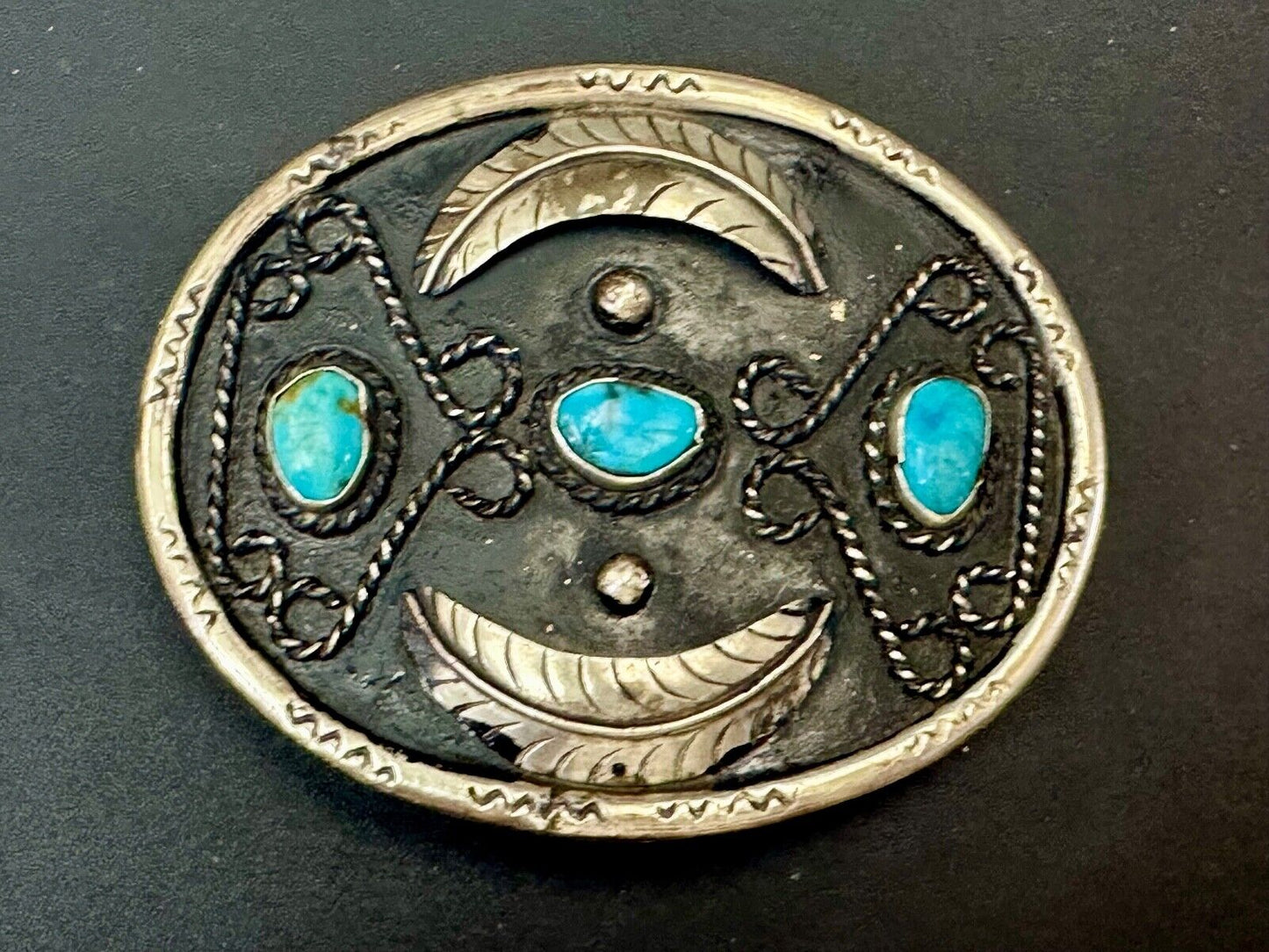 Turquoise stones raised feathers vintage belt buckle marked Sterling 0925 Mexico