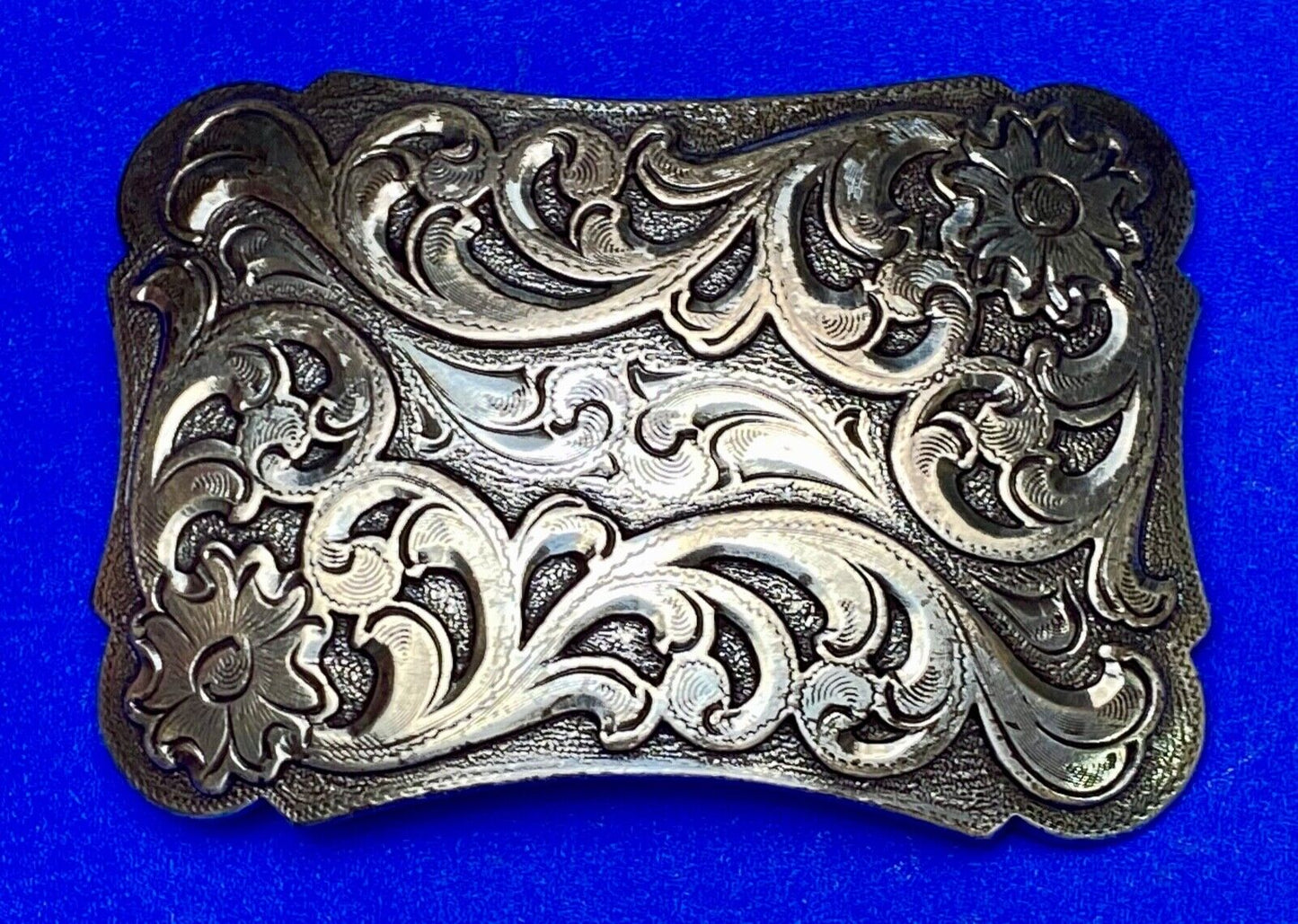 Thick flower swirl silver color western belt buckle