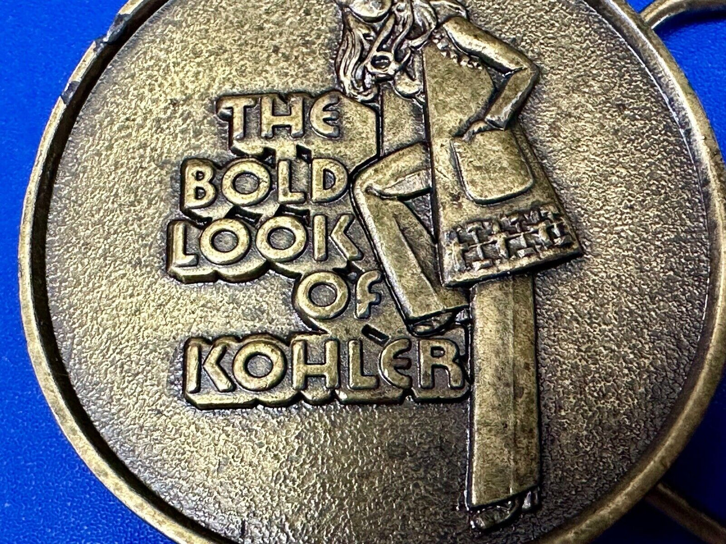 The Bold Look of Kohler Vintage 1977 Lewis round Limited Edition belt buckle