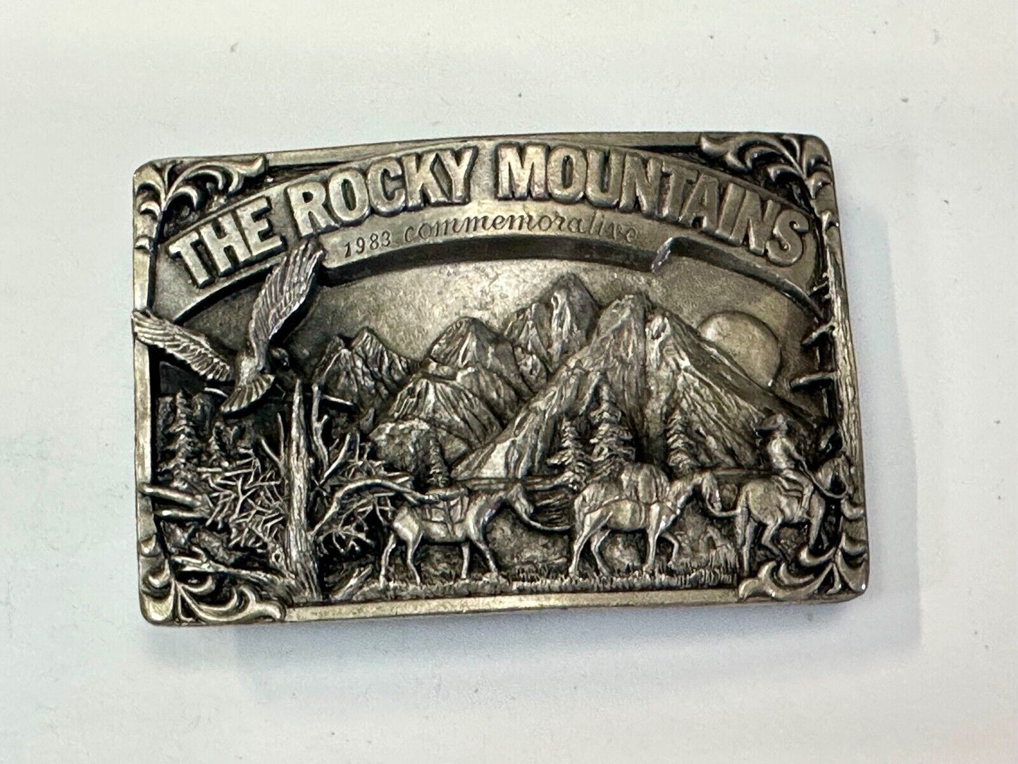 THE ROCKY MOUNTAINS** COMMEMORATIVE BELT BUCKLE VINTAGE 1983 BELT BUCKLE