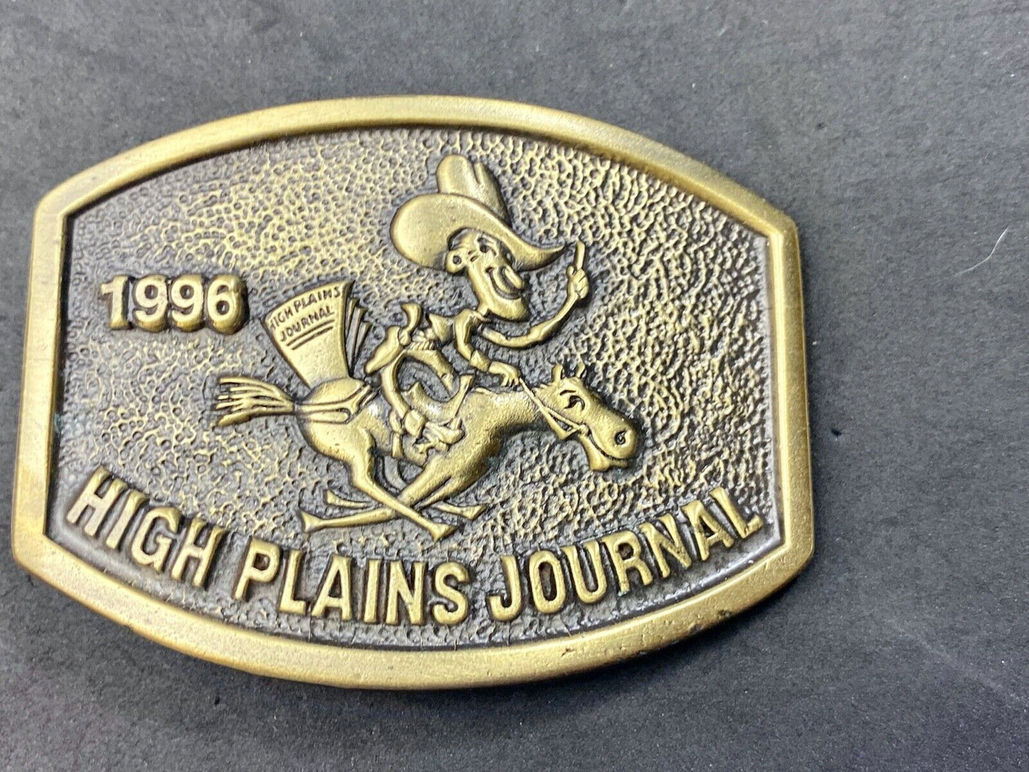Vintage 1996 High Plains Journal Belt Buckle Cowboy Horse Newspaper
