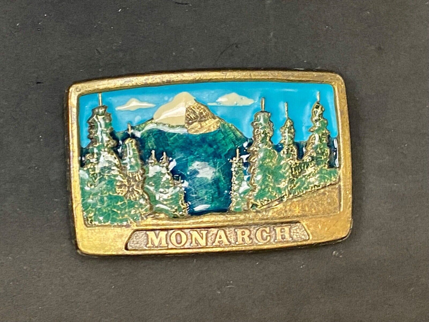 1981 Monarch Commemorative Belt Buckle Wyoming Imountain Clearing No 1003 A