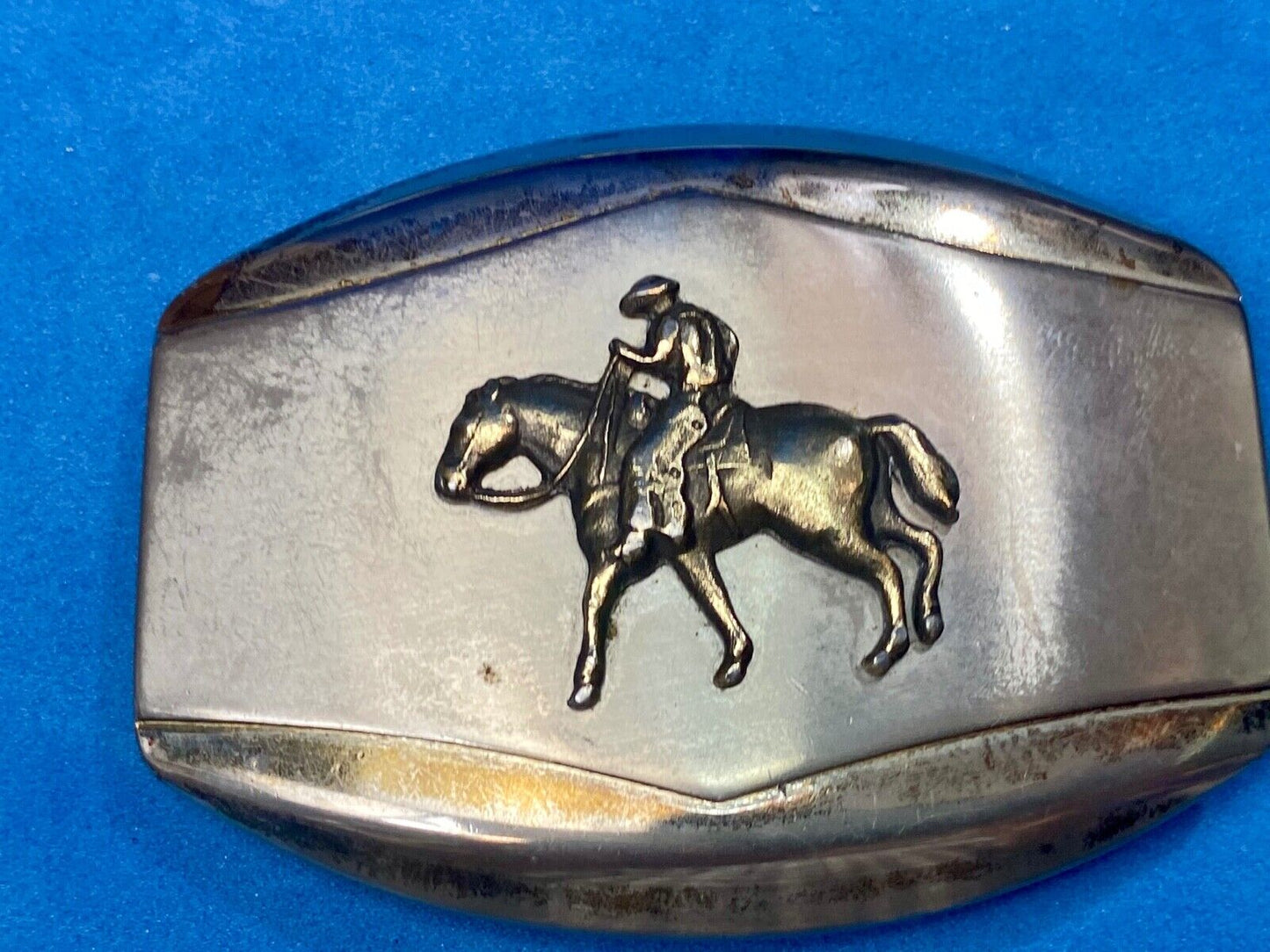 Vintage belt buckle Horseback old west cowboy riding the trail