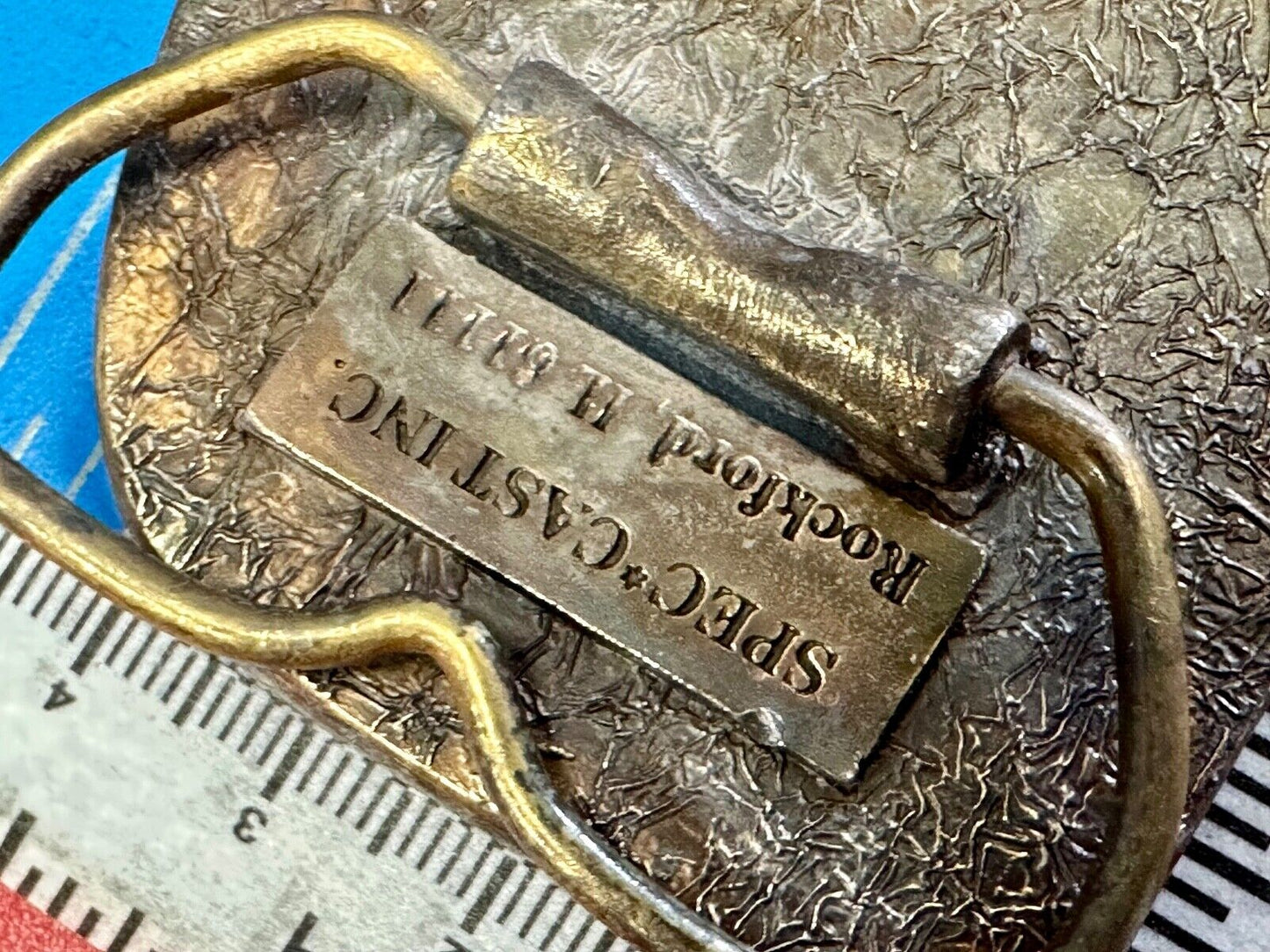 The Tough Tire Team BRi Brad Ragan, Inc. vintage belt buckle by Spec-Cast