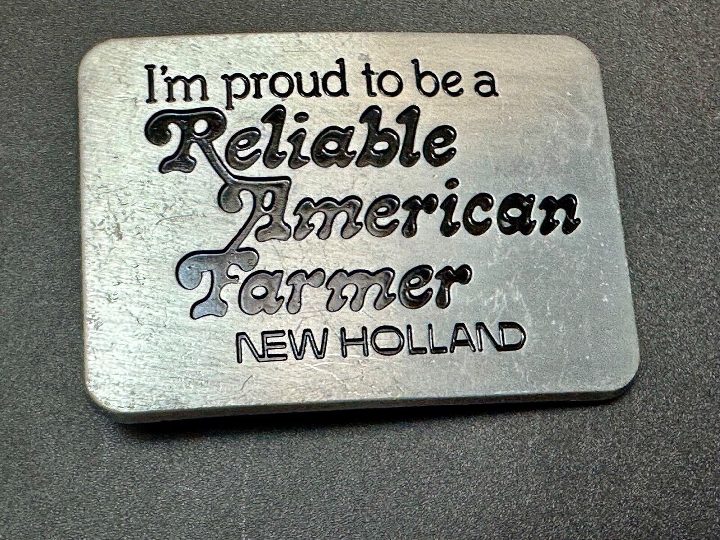 Vintage 1982 NEW HOLLAND I'm Proud to be a Reliable American Farmer Belt Buckle