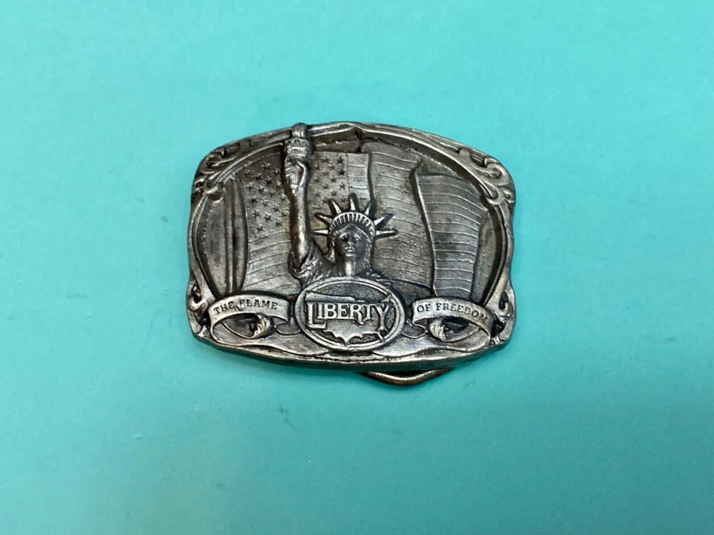 The Flame of Freedom. - Statue of Liberty 1986 Bergamot D-157 belt buckle