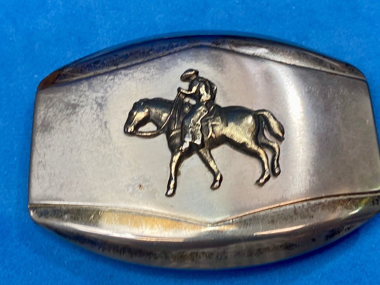 Vintage belt buckle Horseback old west cowboy riding the trail
