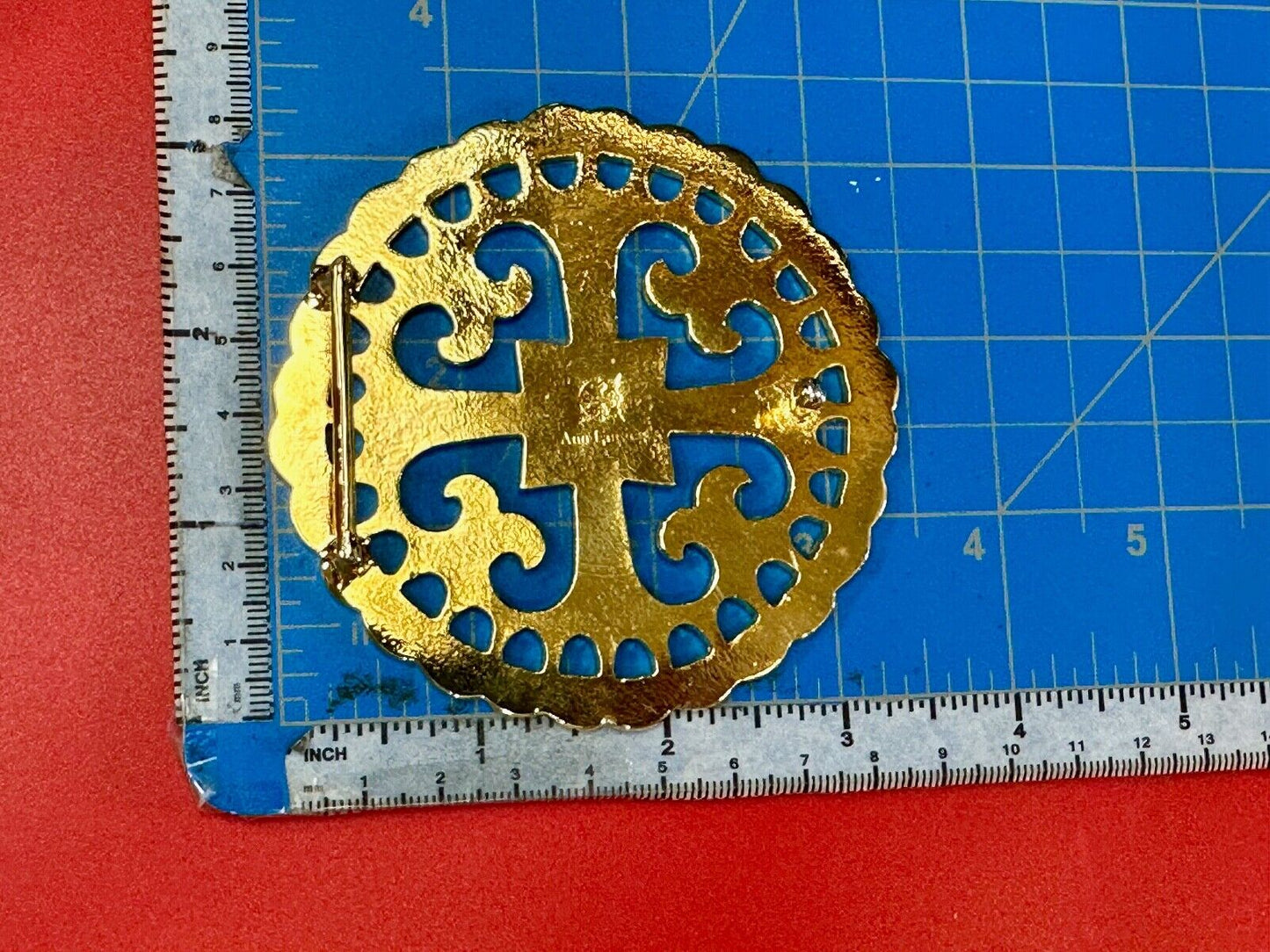 vintage Celtic pattern round cutout belt buckle by designer Ann Lansing