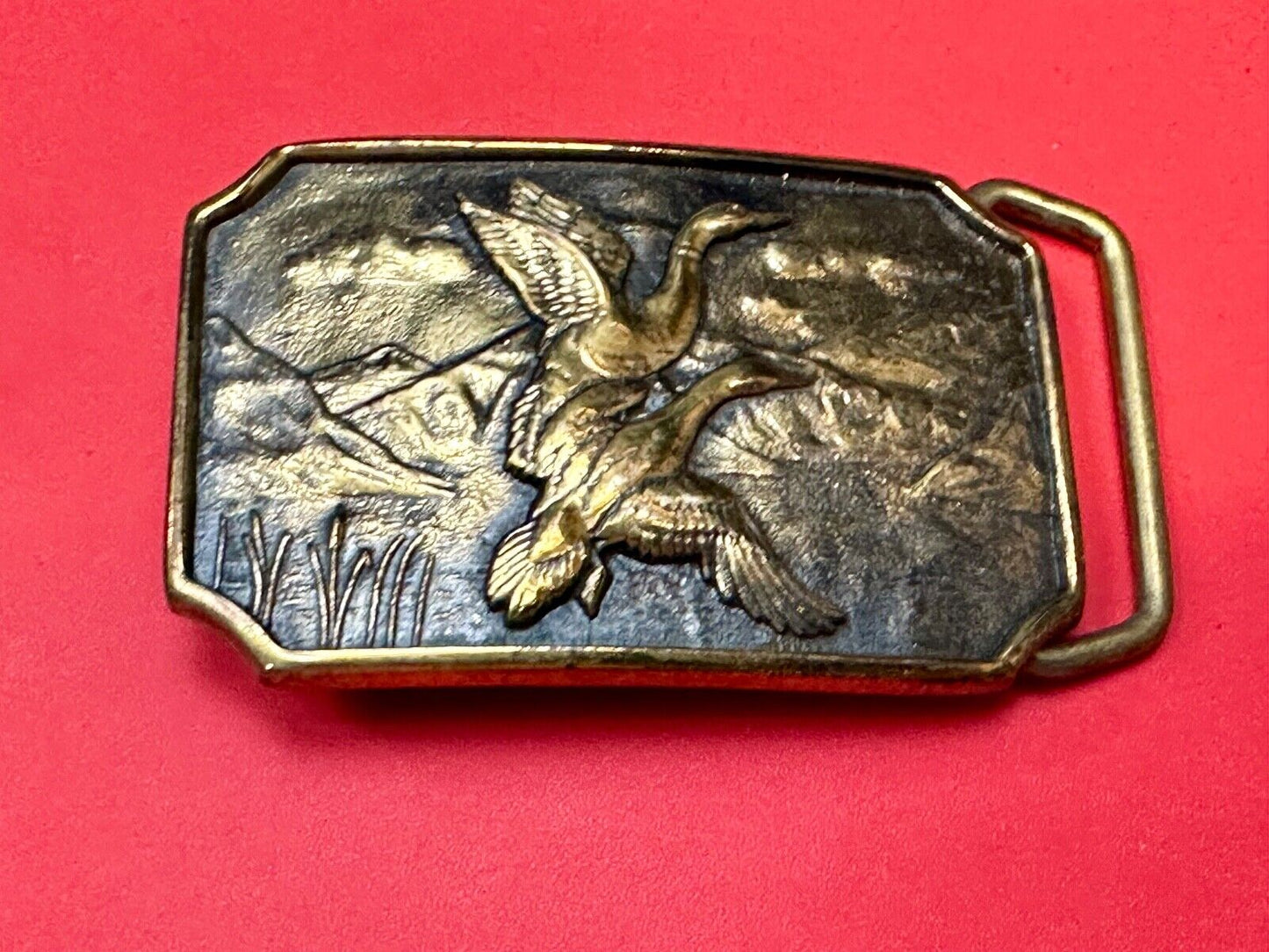 Two ducks flying from pond cat tails Nature Solid Brass belt buckle by BTS