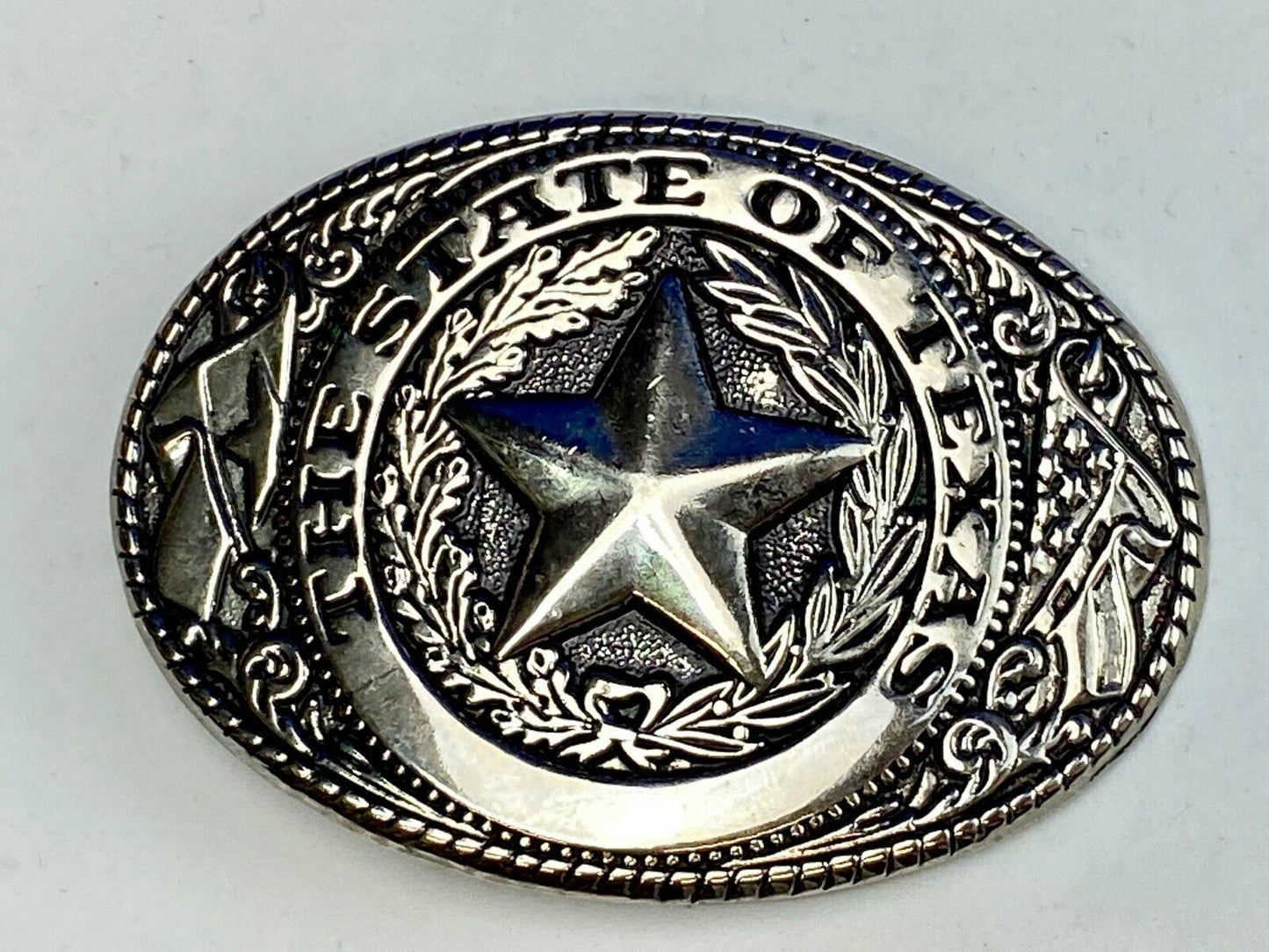 THE GREAT STATE OF TEXAS Star Black and Silver color flower swirl belt buckle