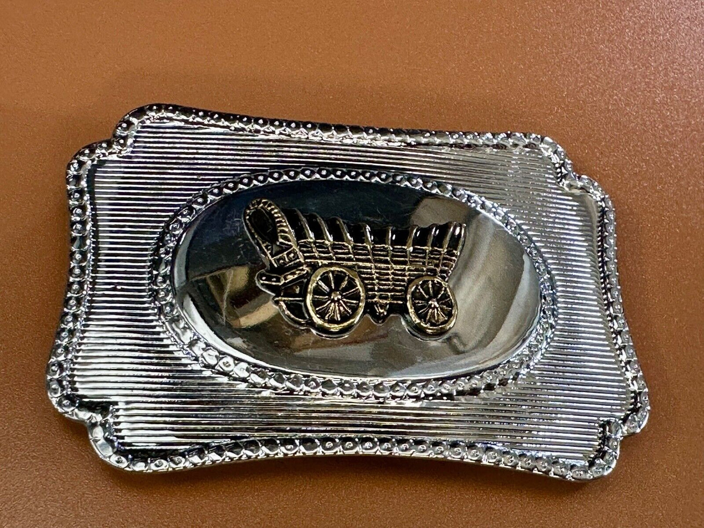Vintage Covered Wagon - western two tone outlined belt buckle