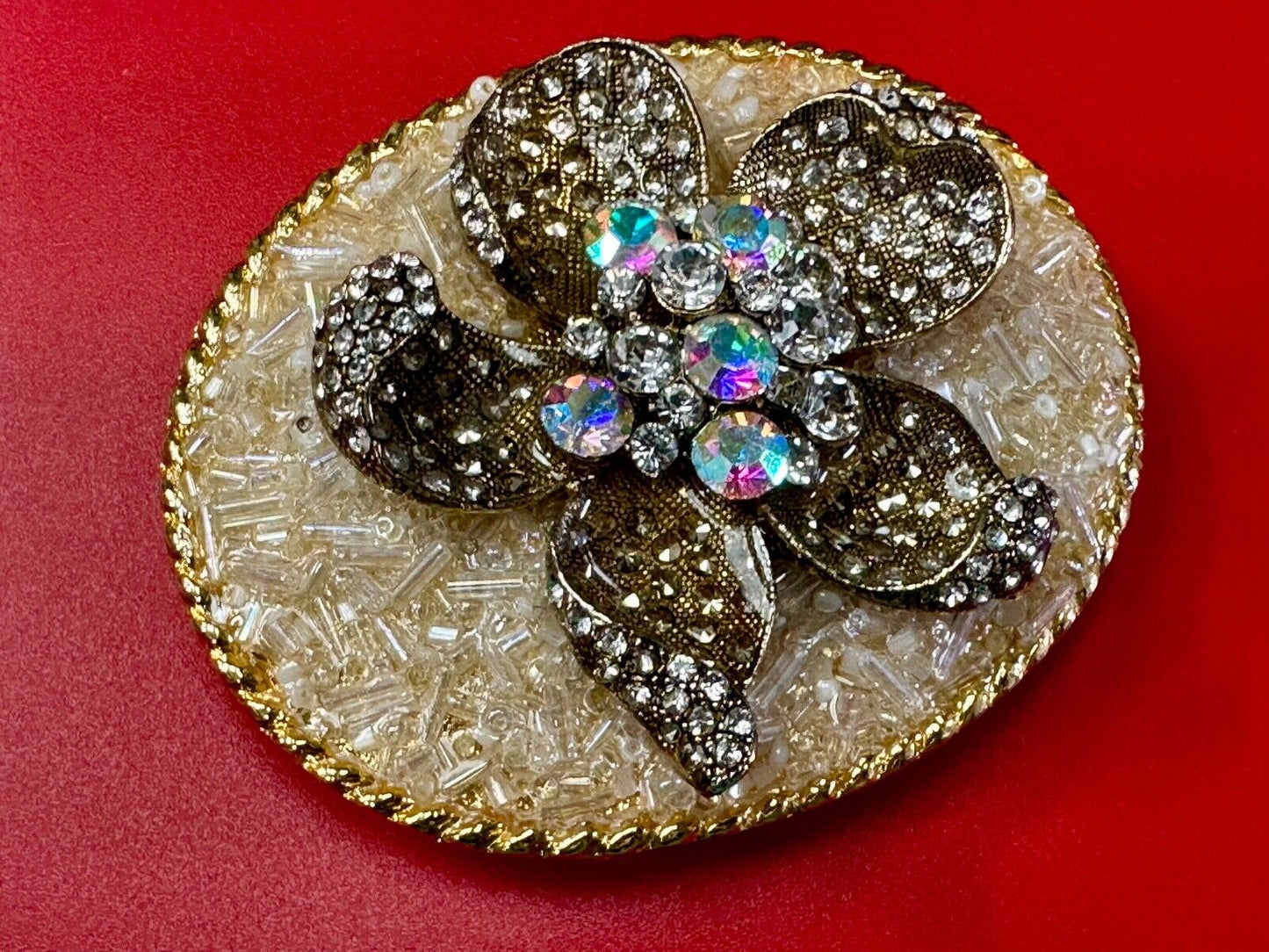 Beautiful chunky goldtone flower centerpiece in rhinestone accented belt buckle