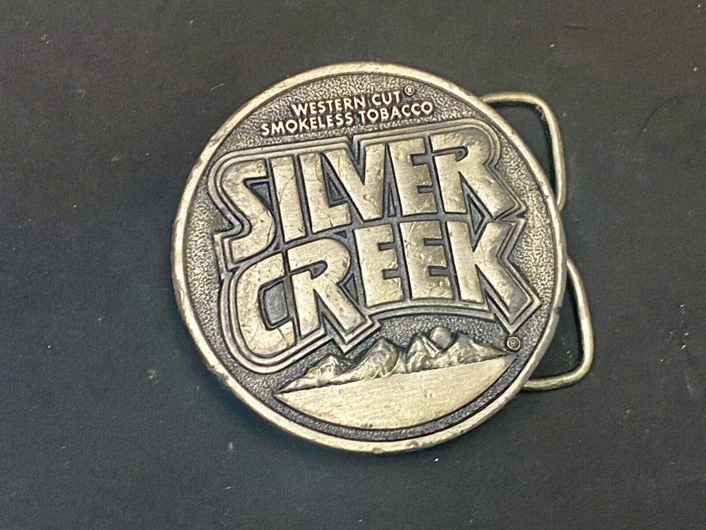 Vintage 1982 Western Cut Smokeless Tobacco Silver Creek Siskiyou Belt Buckle