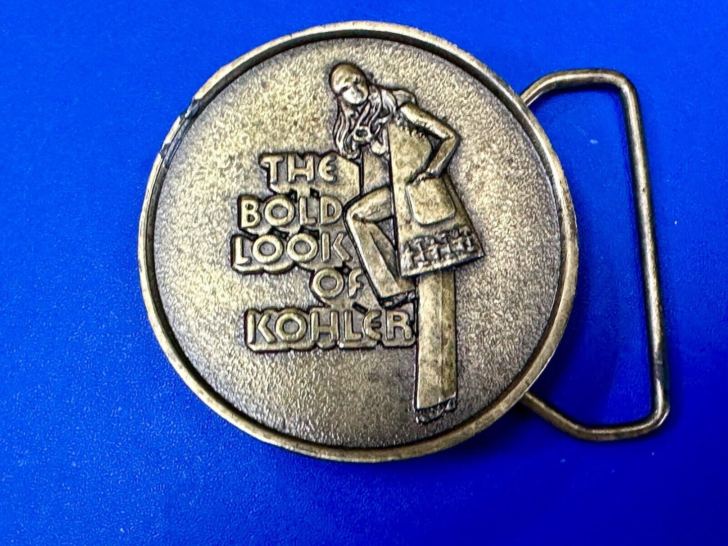 The Bold Look of Kohler Vintage 1977 Lewis round Limited Edition belt buckle