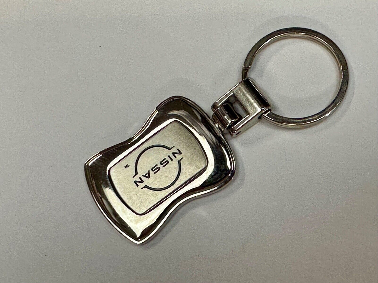 Sutherlin Nissan of Florida car truck dealers logo emblem Keychain - Key Ring