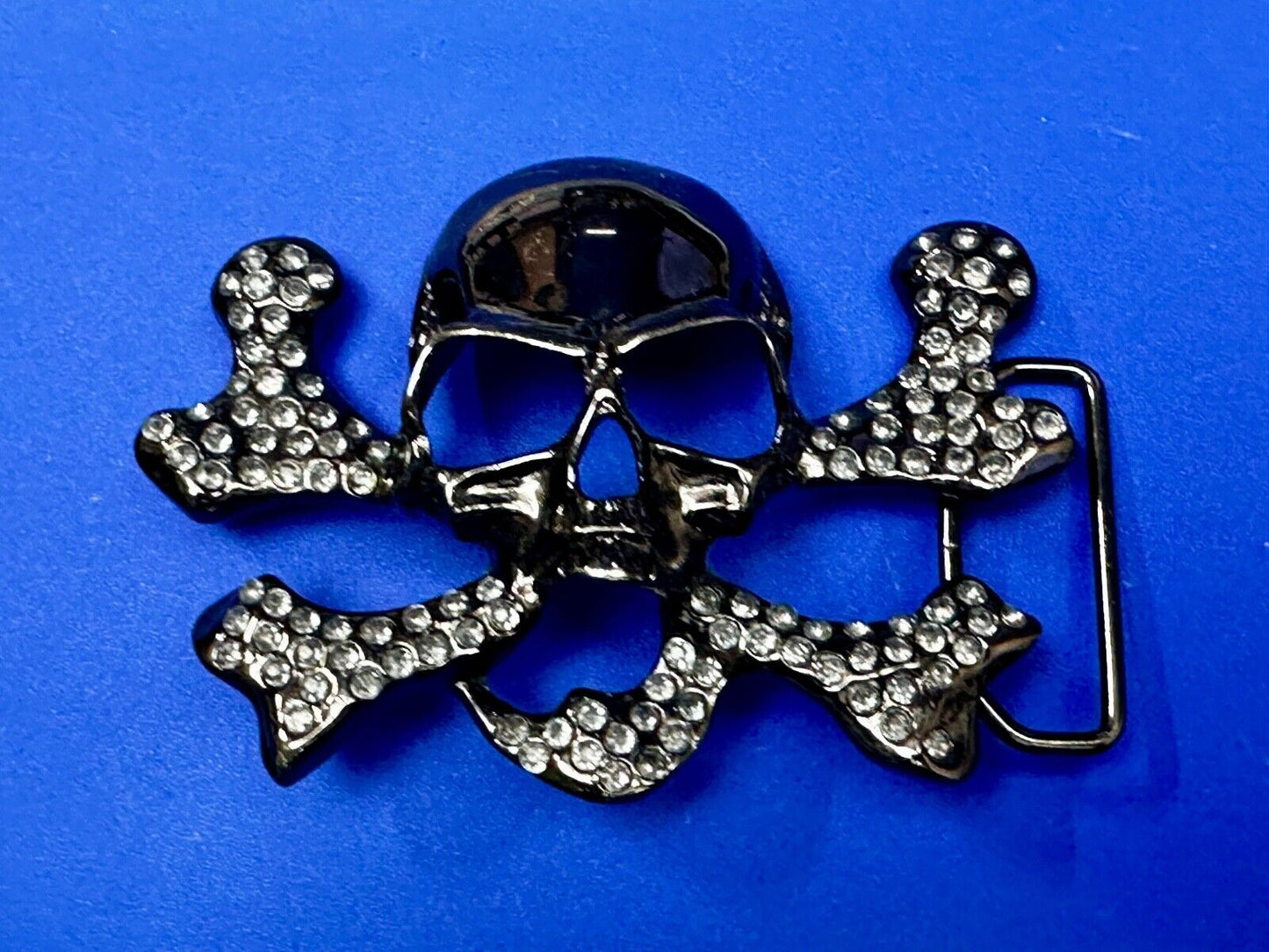 Black color skull and crossbones Belt Buckle covered in Rhinestone accents