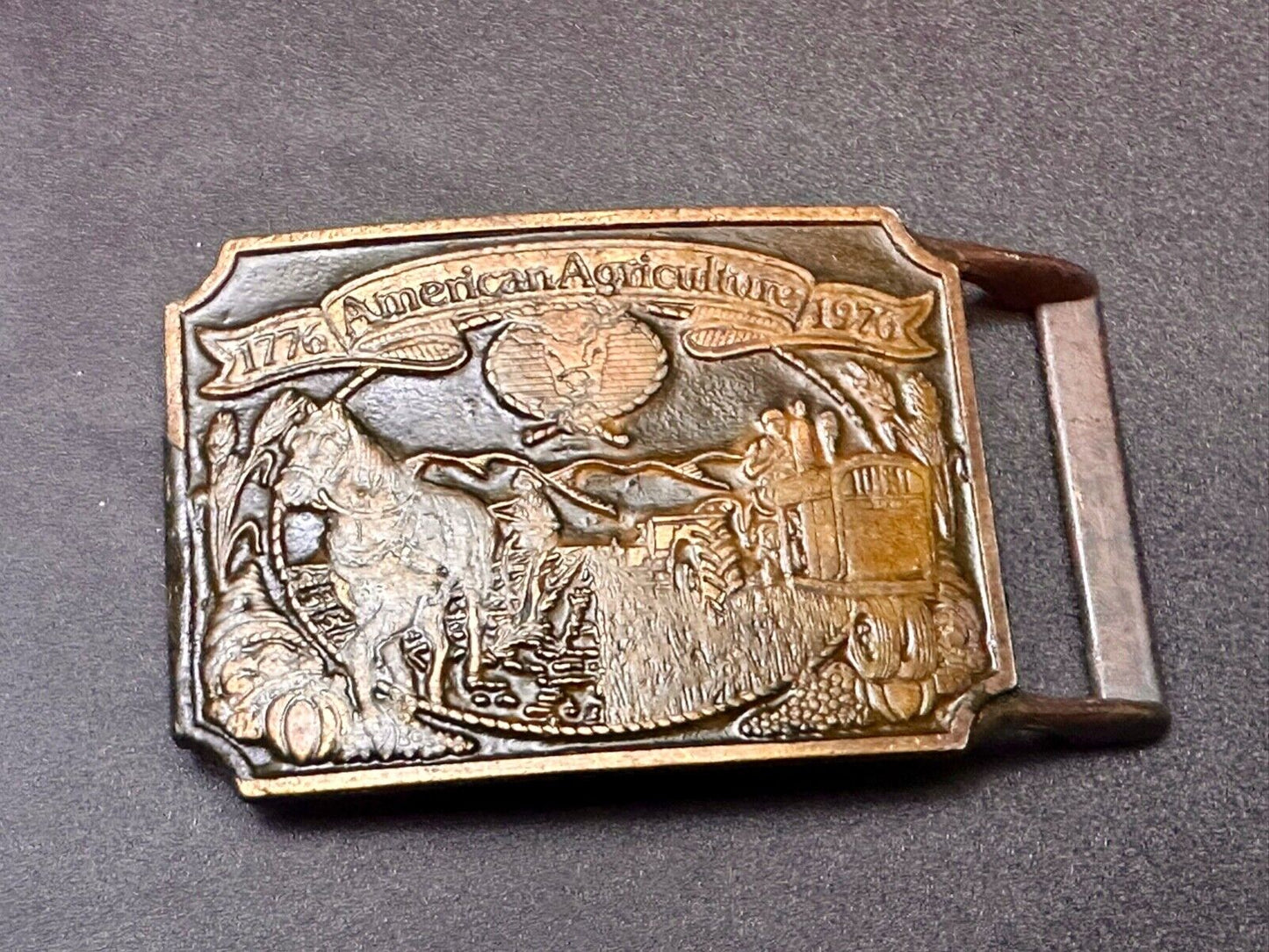 Bicentennial American Agriculture Horse to tractor, Vtg belt buckle by Ortho