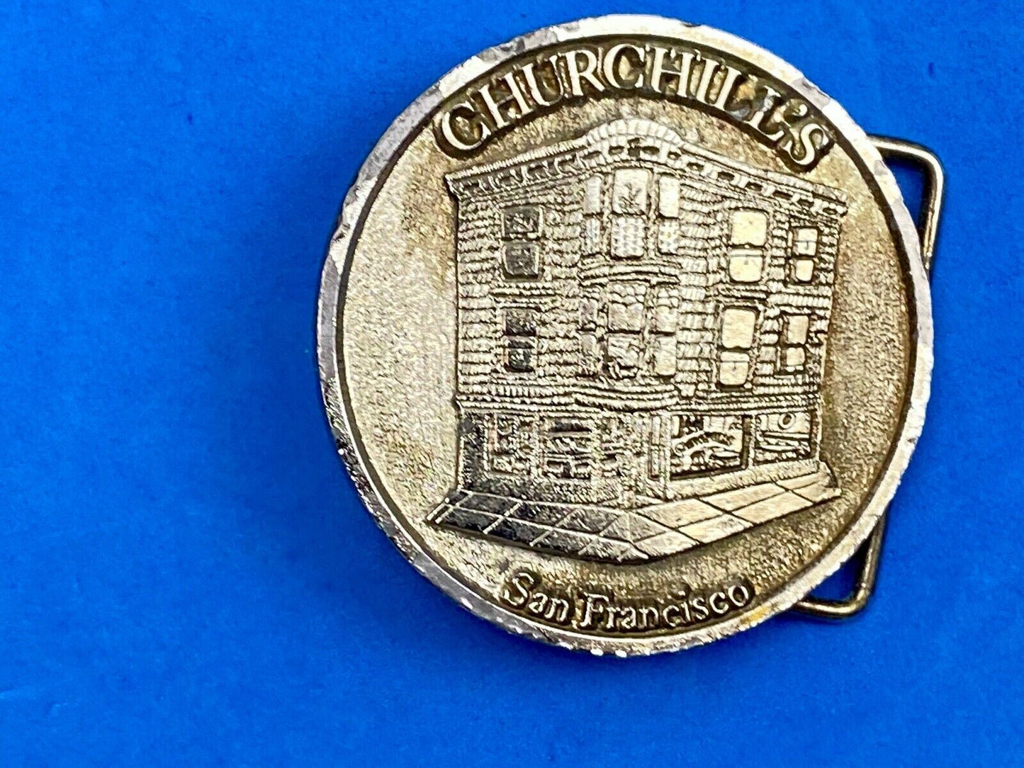 Vintage Churchill's San Francisco belt buckle by American pewter works the bar?
