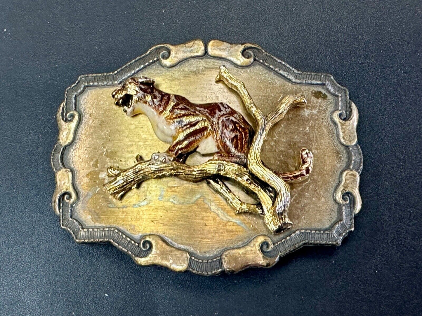Vintage bobcat? leaping from branch western framed belt buckle by Raintree
