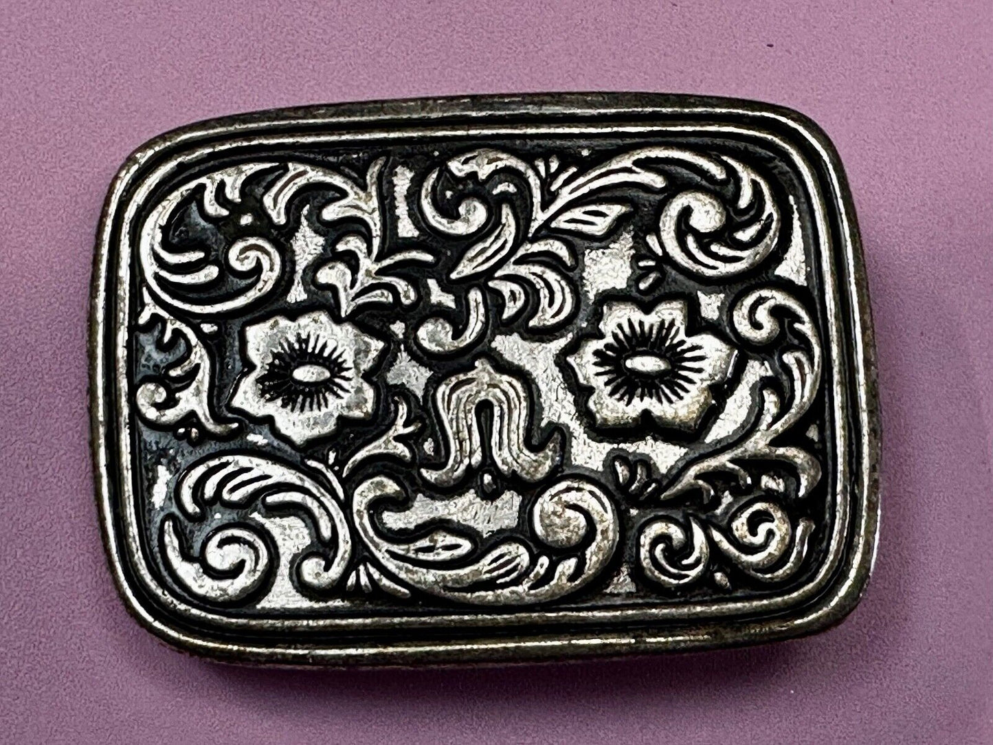 Vintage black and silver tone western flower floral theme cowboys belt buckle