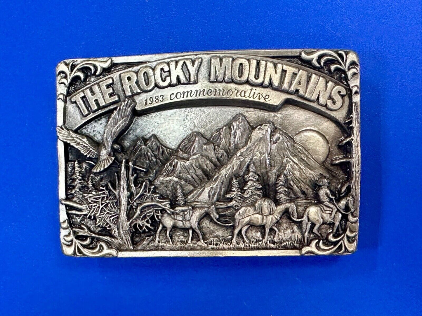 THE ROCKY MOUNTAINS** COMMEMORATIVE BELT BUCKLE VINTAGE 1983 BELT BUCKLE