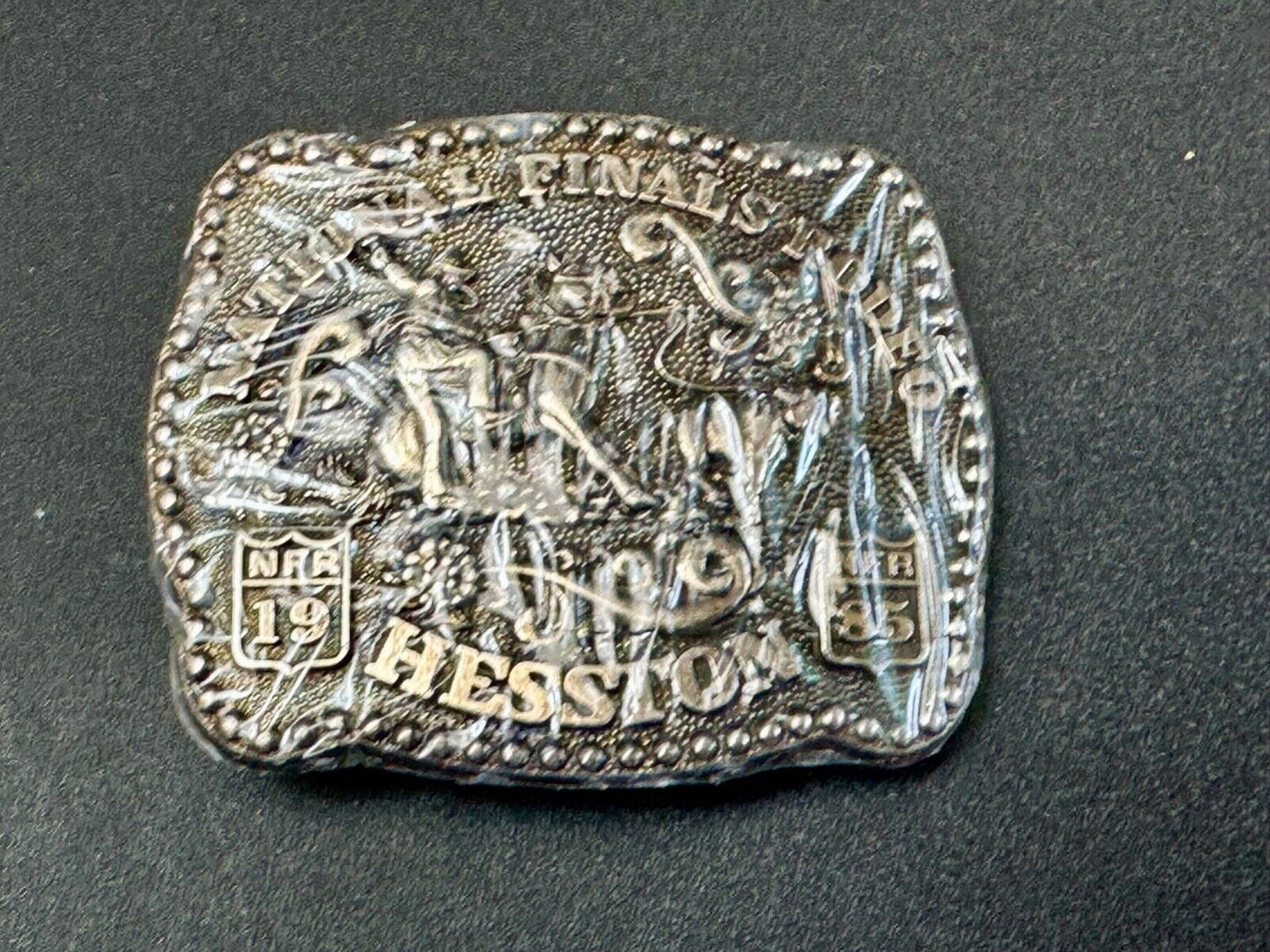 1985 Hesston Youth (small) NFR Belt Buckle in original shrink-wrap Third Eddn,