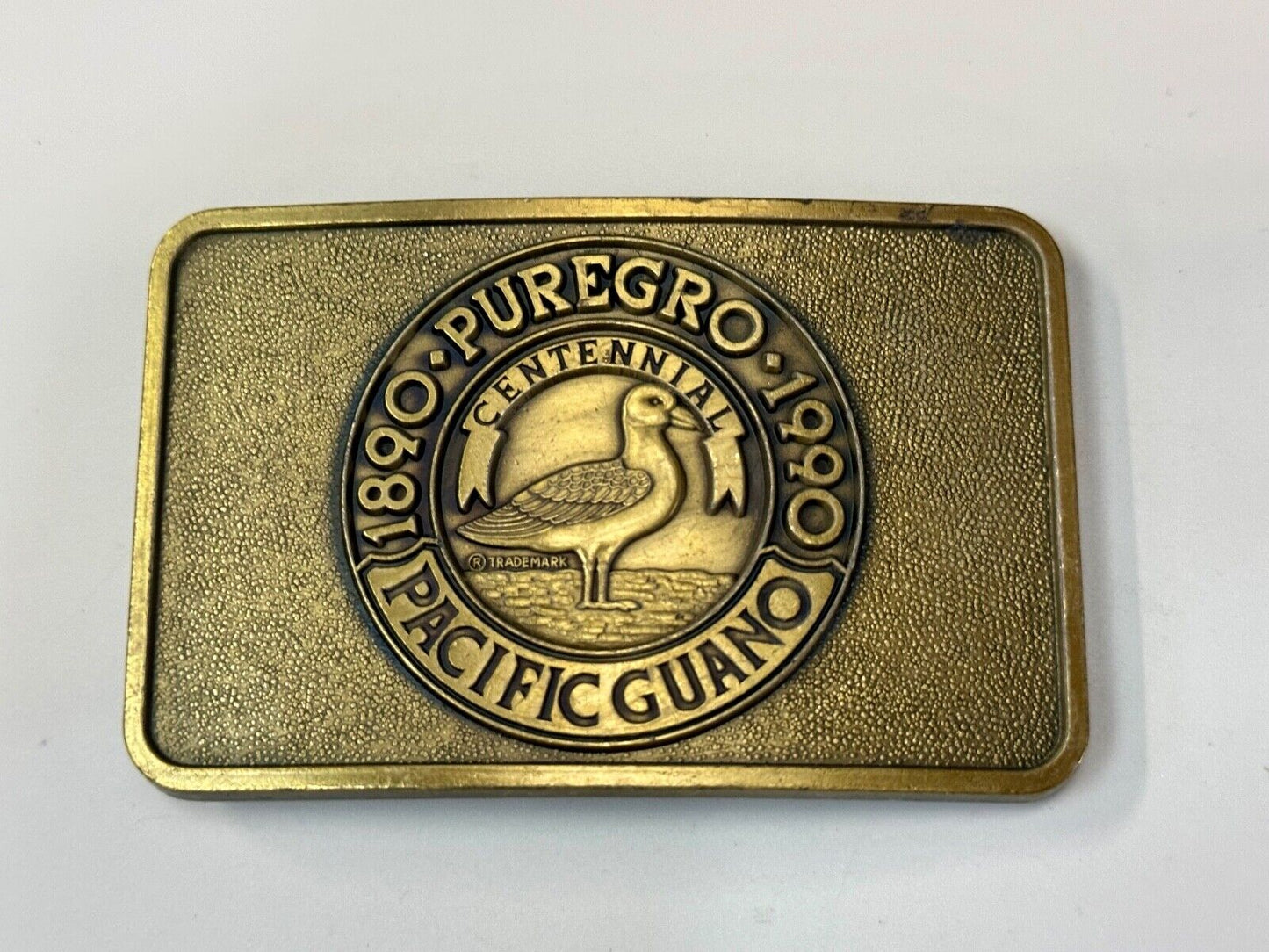 1990 Puregro Pacific Guano Centennial Celebration vintage belt buckle