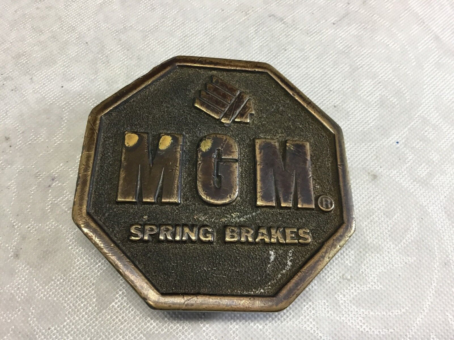 VINTAGE 1977 **MGM SPRING BRAKES** COMPANY BELT BUCKLE