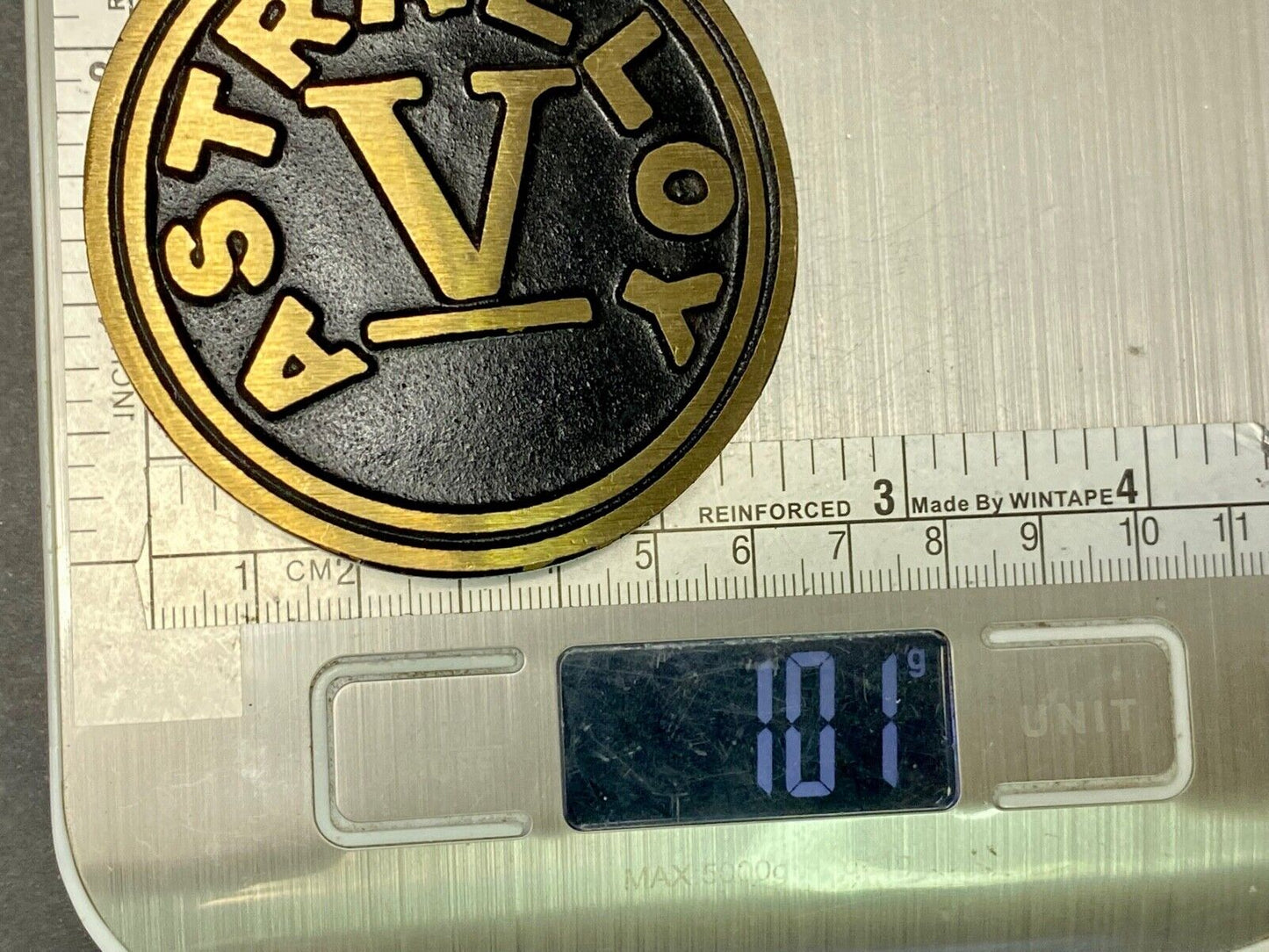 Astralloy Vis a unique, deep-air hardened steel promotional brass belt buckle
