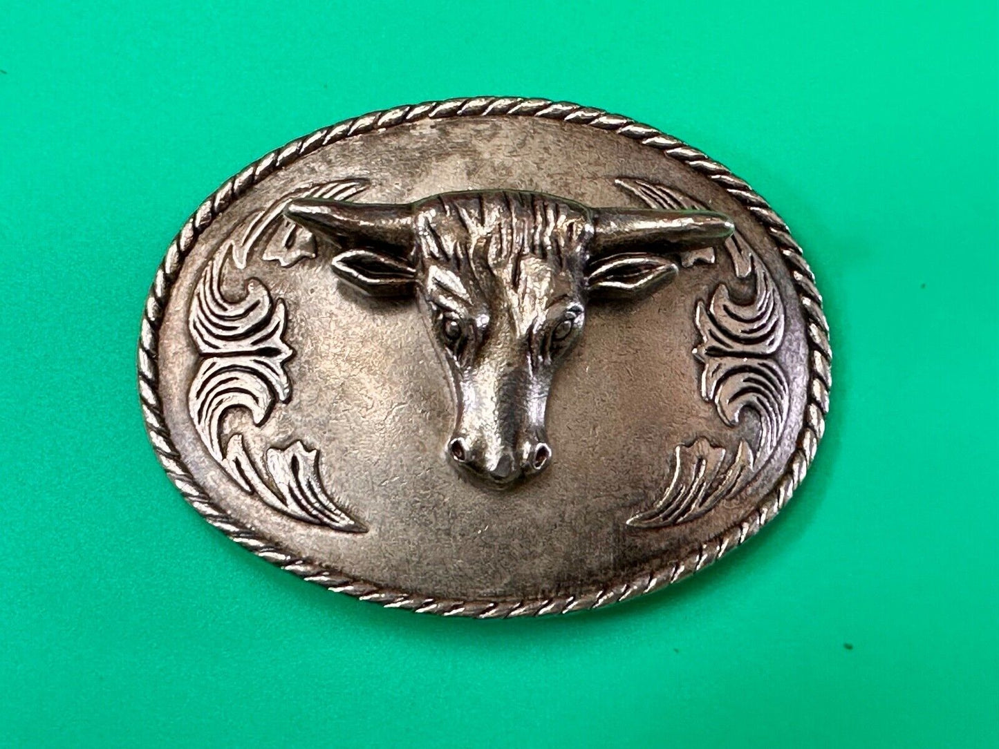 The Longhorn cow steer - cowboys cowgirls western oval silver tone belt buckle