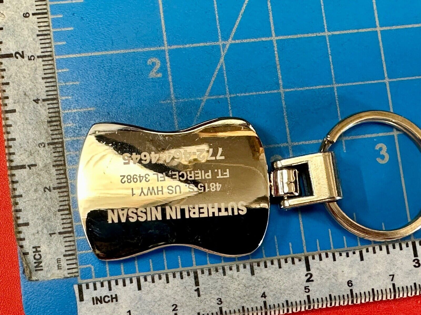 Sutherlin Nissan of Florida car truck dealers logo emblem Keychain - Key Ring