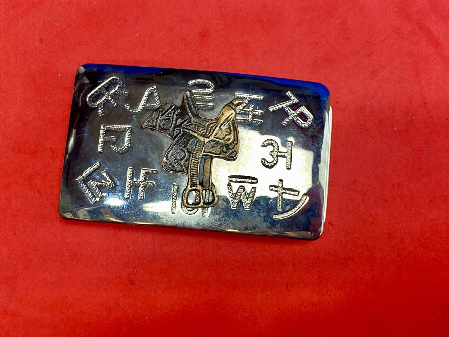 Vintage Chambers western Saddle Belt Buckle with cattle branding symbols