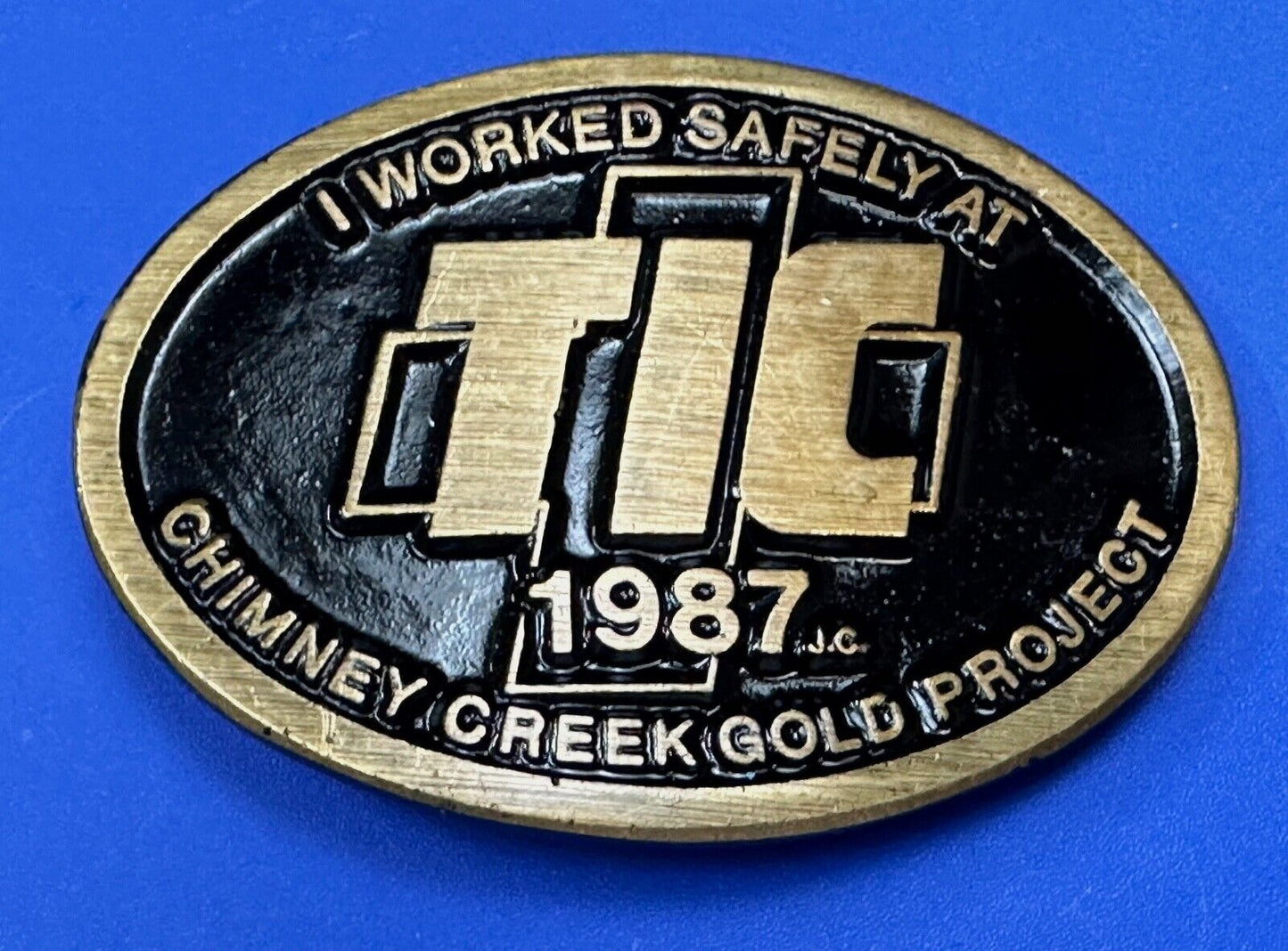 Vintage 1987 TIC Chimney Creek Gold Project Safety award brass belt buckle