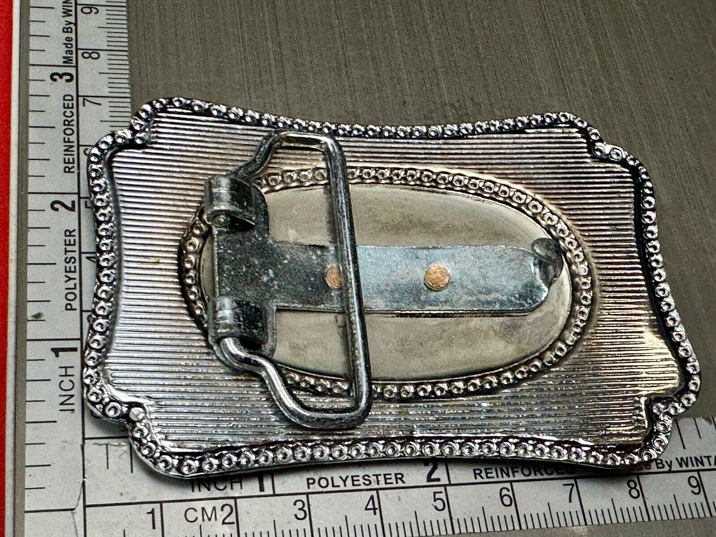 Vintage covered wagon western horse drawn transportation belt buckle