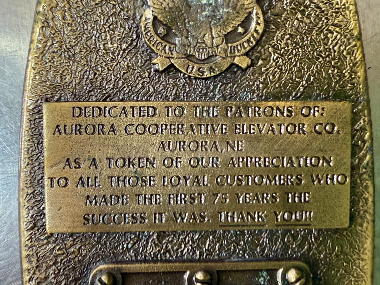 Aurora Co-Op Elevator Company at your Service 75th Anniversary Belt Buckle