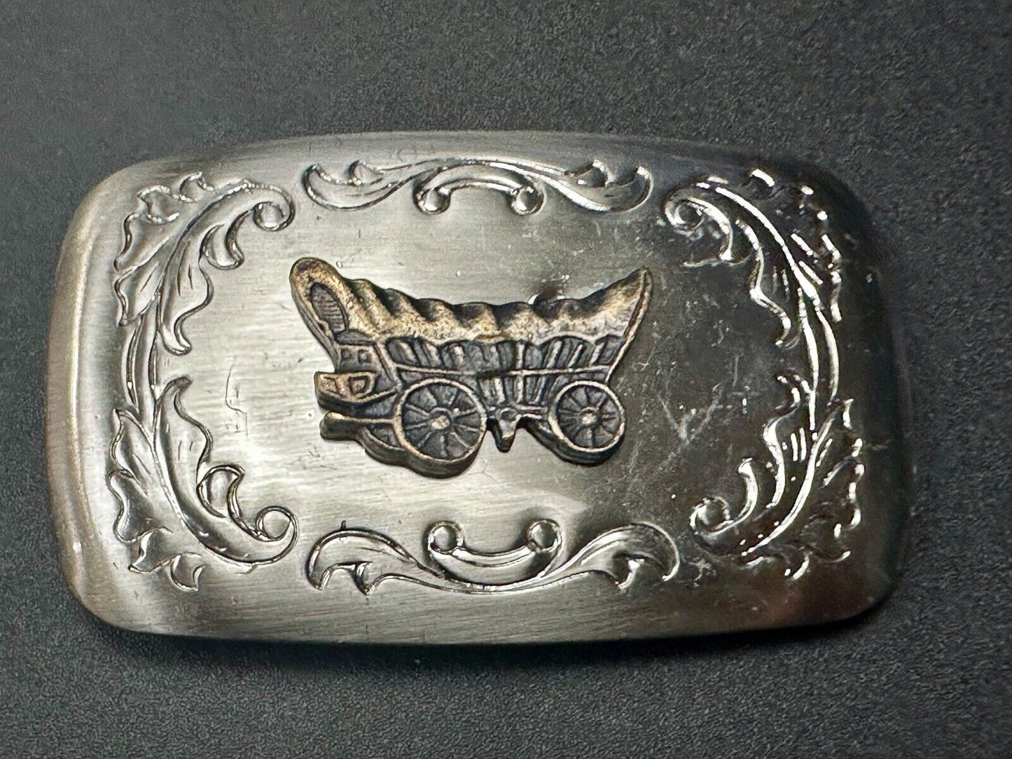 Vintage covered wagon two tone western mixed metal belt buckle