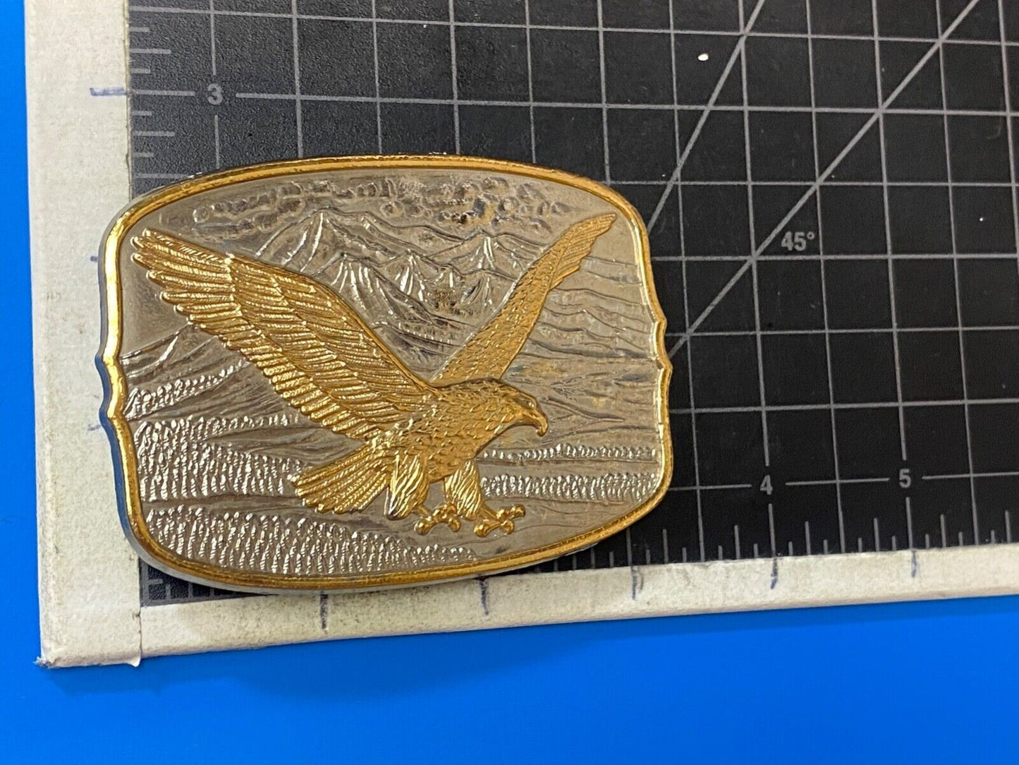 AMERICAN EAGLE Majestically hunting flying over mountains Numbered belt buckle