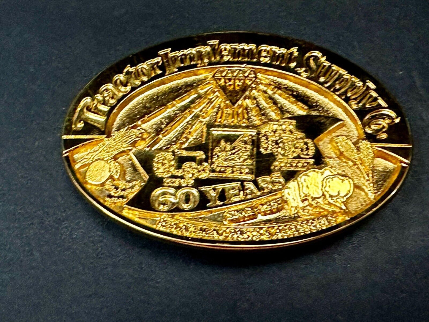 60 years TISCO Tractor Implement Supply company Vintage Belt Buckle by Speccast