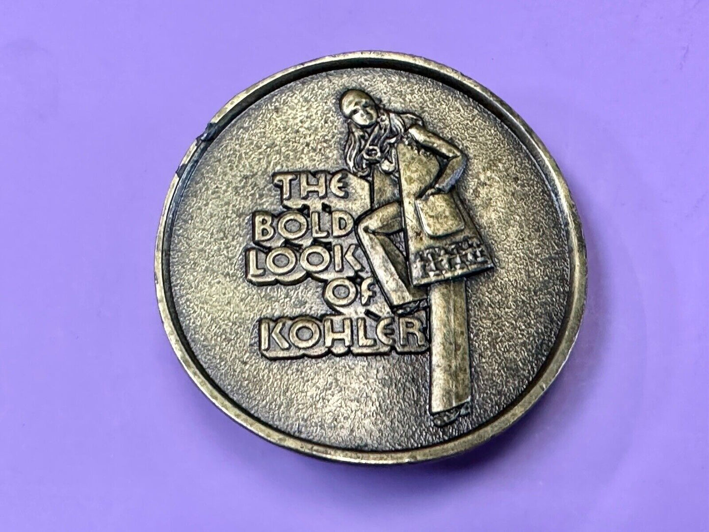 The Bold Look of Kohler Vintage 1977 Lewis round Limited Edition belt buckle