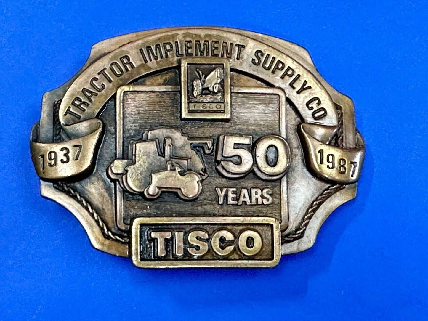 Tisco 50 year celebration Tractor farm supply company promo 1986 belt buckle