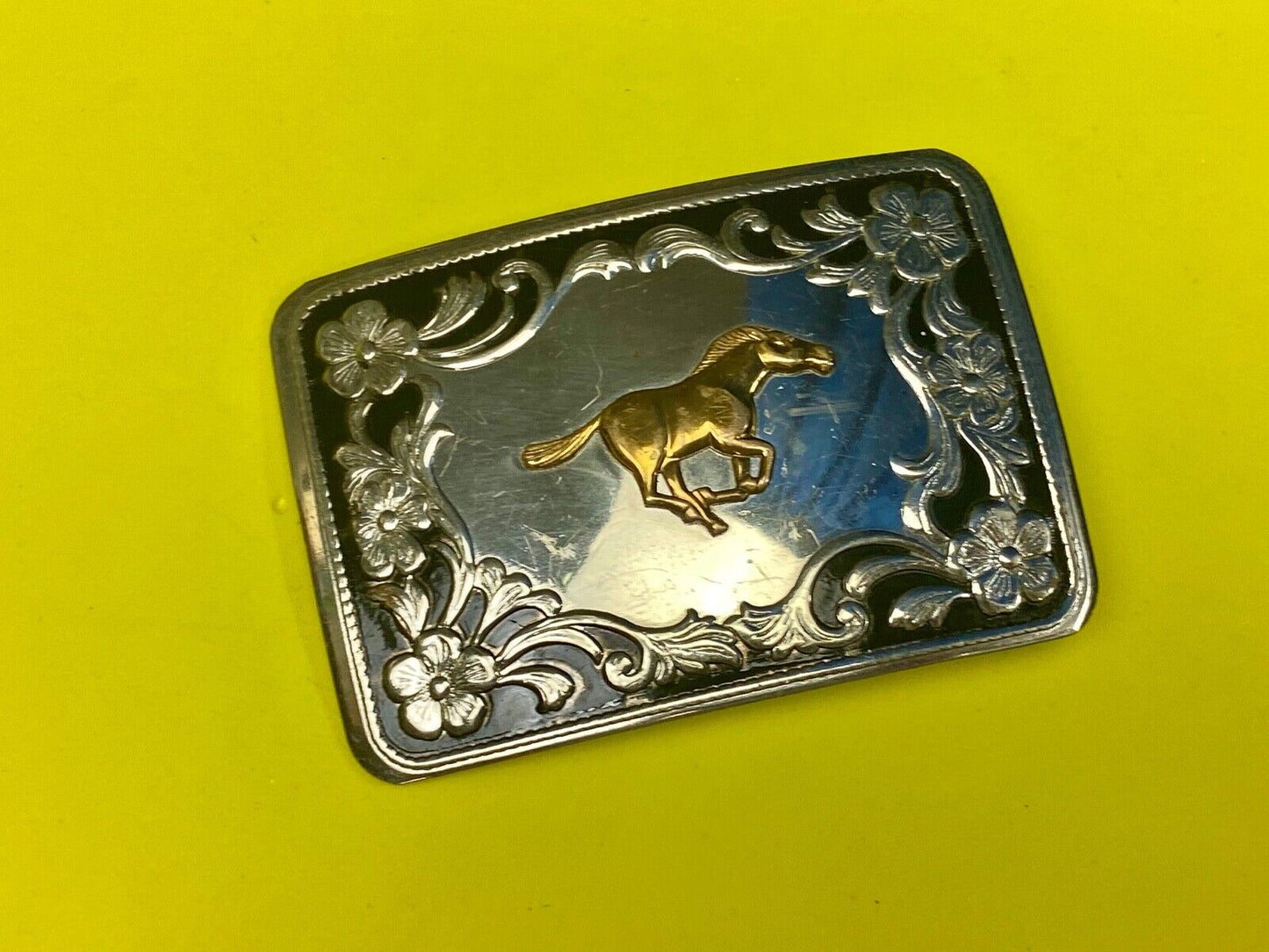 Antique Horse western Nickle Silver and black paint flower swirl belt buckle