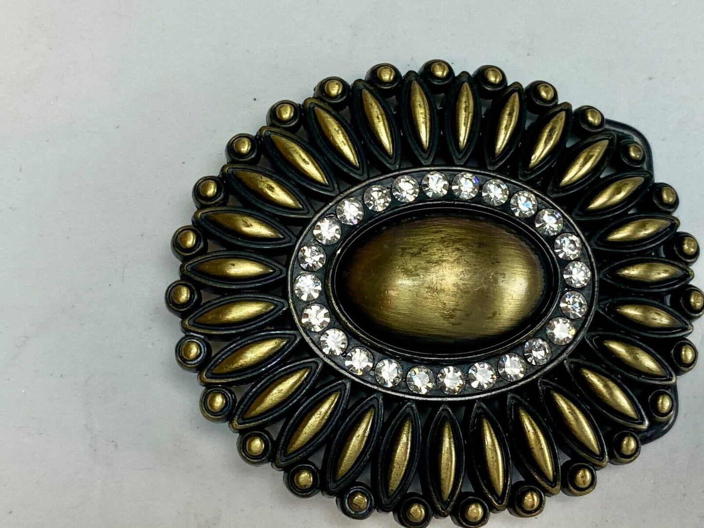 Beautiful southwest vibe layered belt buckle with ring of rhinestones