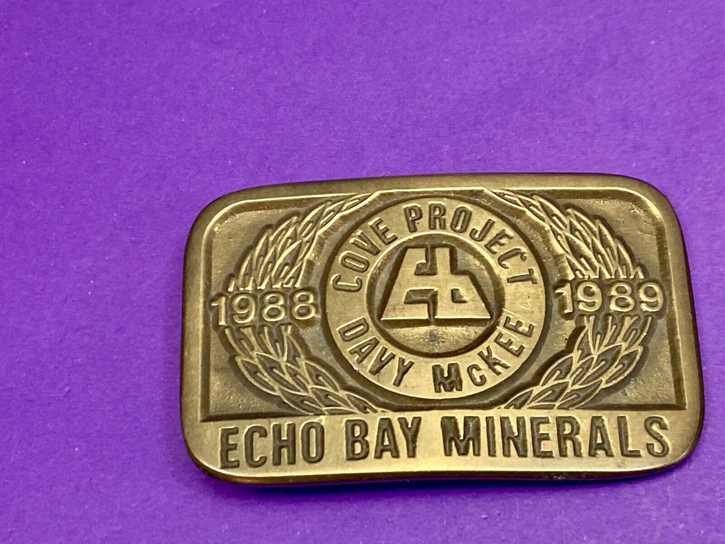 Vintage 1989 **ECHO BAY MINERALS** COVE PROJECT MINING SOLID BRASS BUCKLE