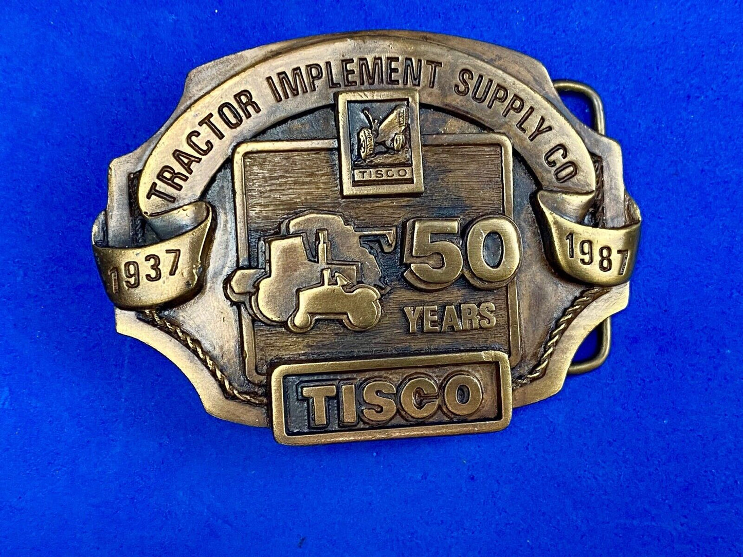 Vintage 1986 Tisco Tractor 50 years Anniversary Belt Buckle by Siskiyou