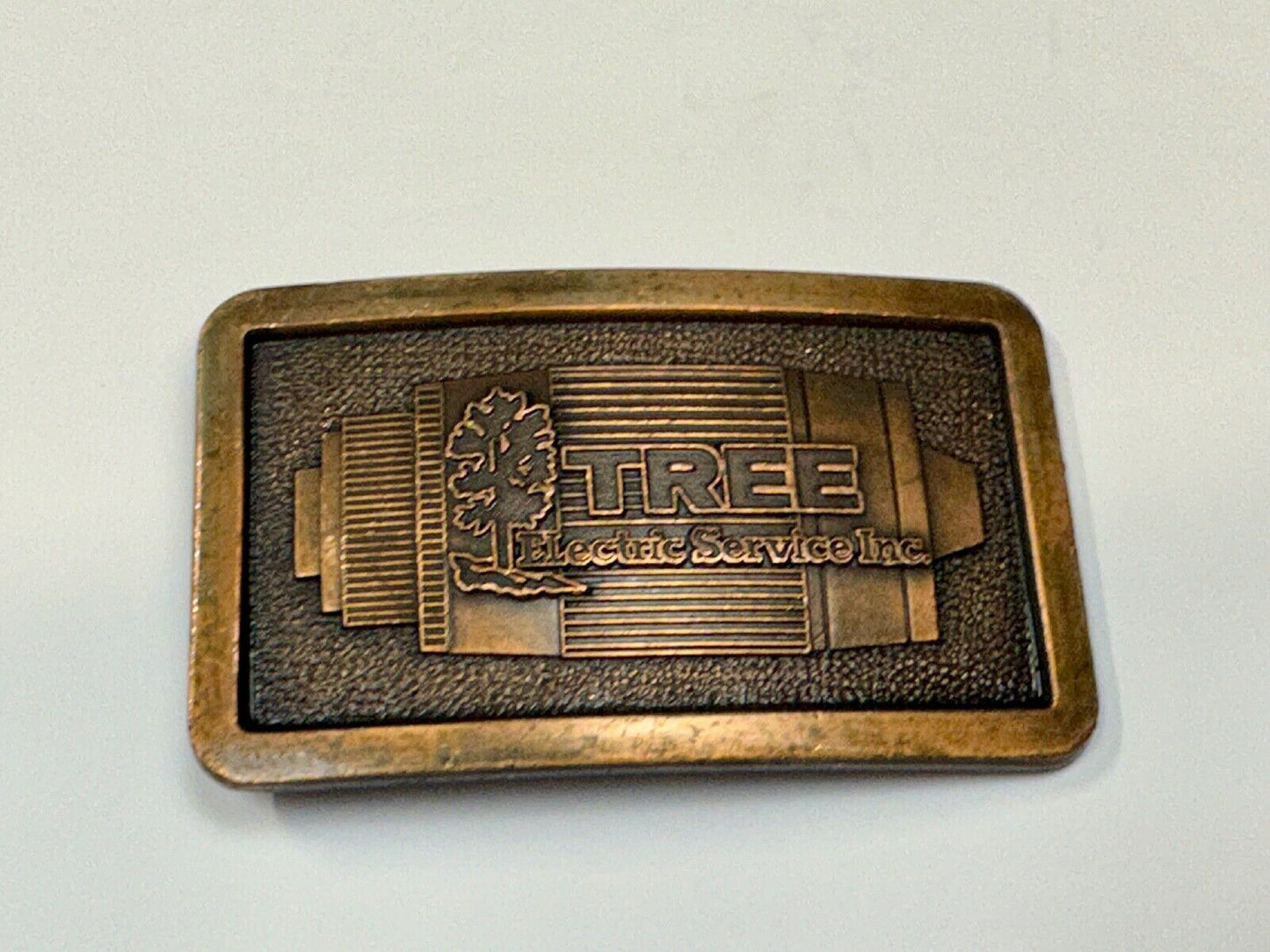 Tree electric service INC Vintage advertising promo brass tone Belt Buckle
