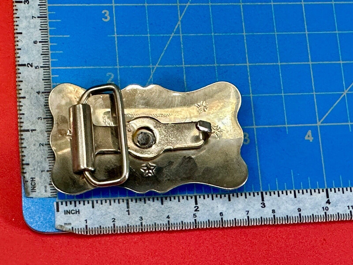 Vintage Cowboy Saddle Bronc western two tone belt buckle with star accents