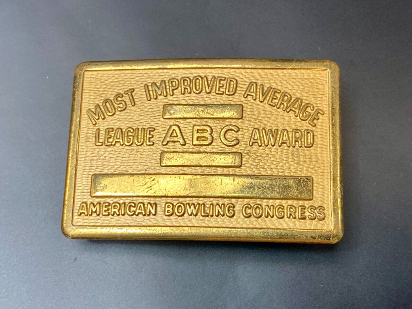 AMERICAN BOWLING CONGRESS MOST IMPROVED AVERAGE AWARD BELT BUCKLE BLANK RIBBON