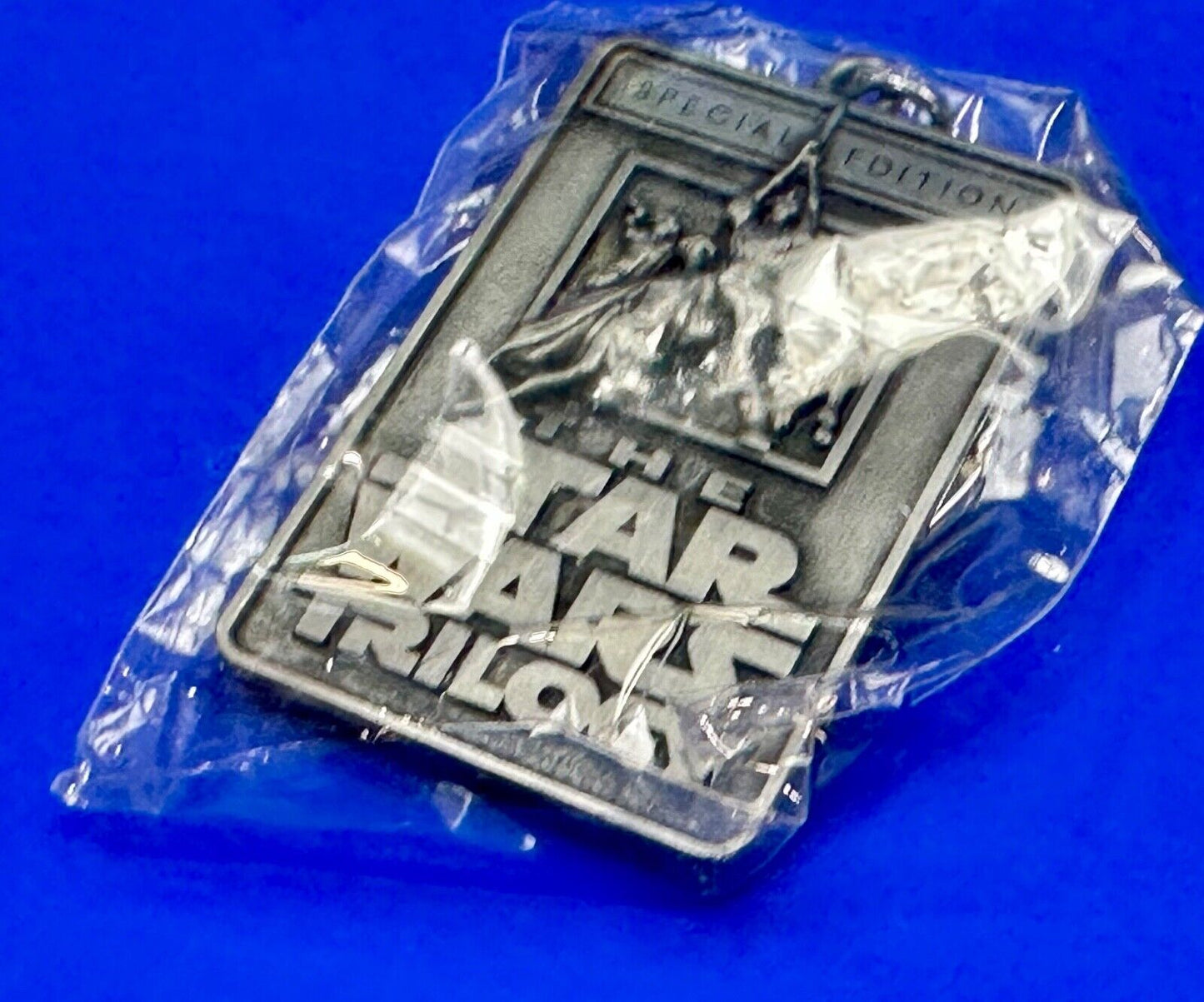 The Star Wars Trilogy Logo Emblem NOS Keychain!