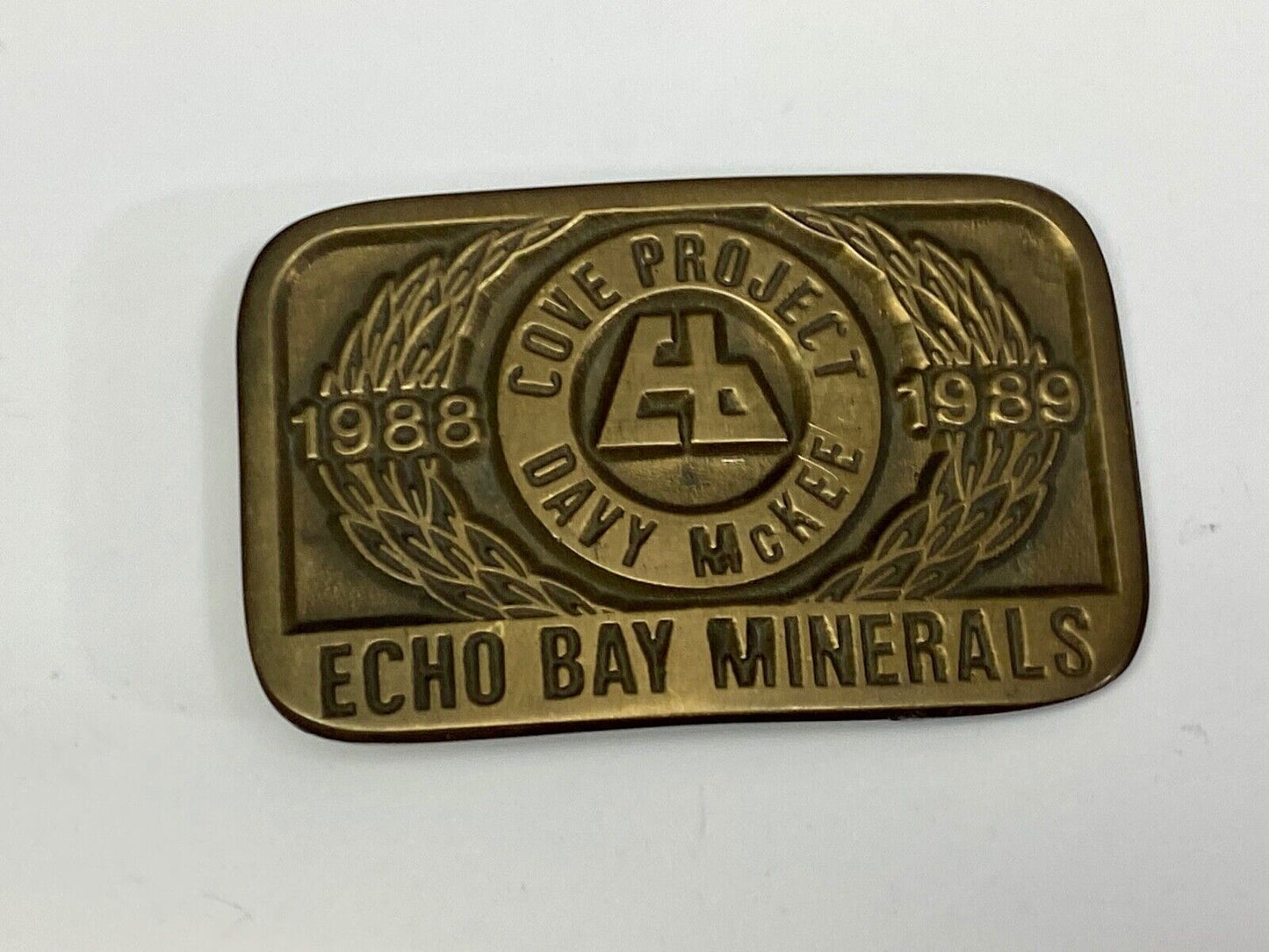 Vintage 1989 **ECHO BAY MINERALS** COVE PROJECT MINING SOLID BRASS BUCKLE