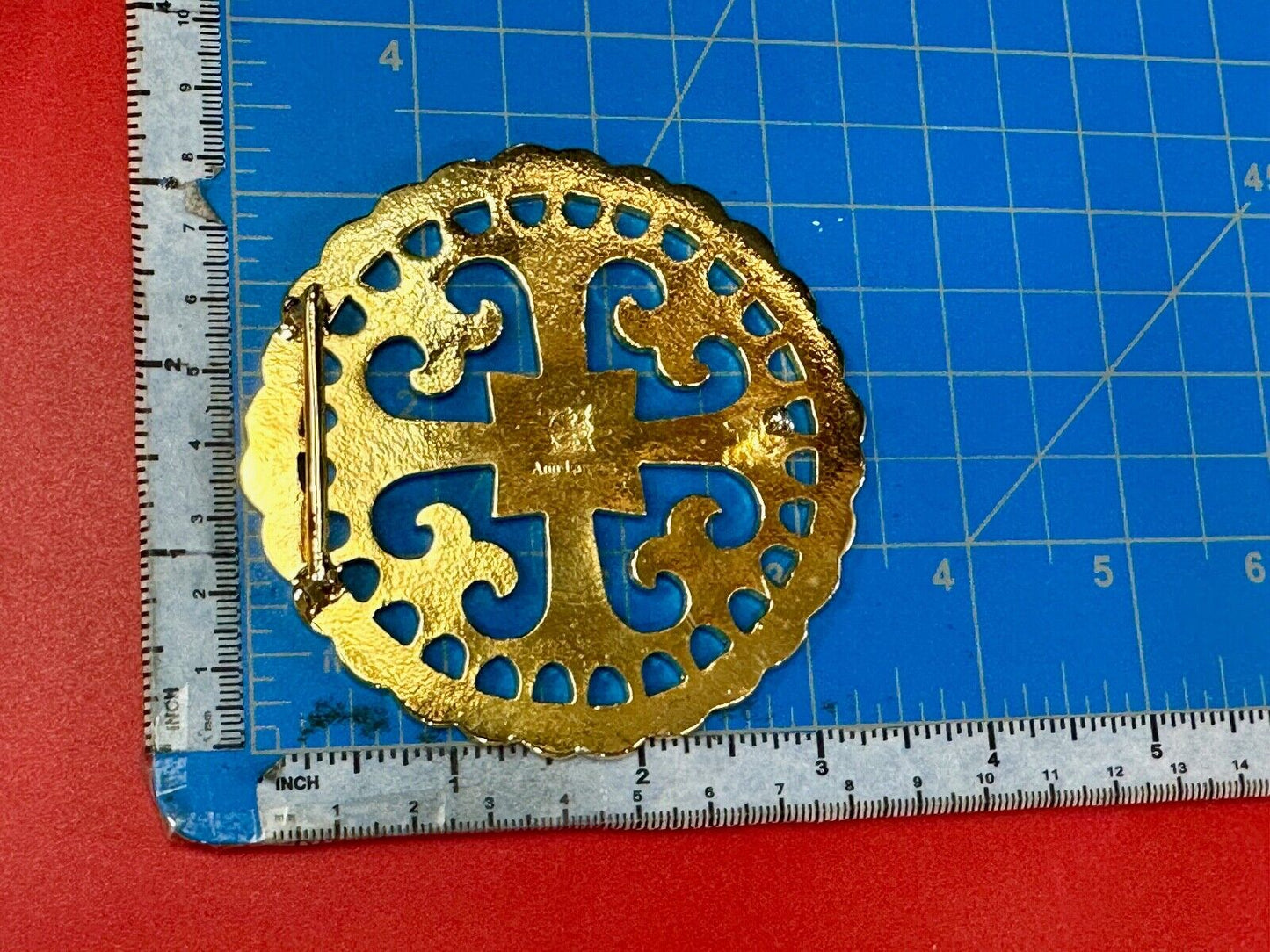 vintage Celtic pattern round cutout belt buckle by designer Ann Lansing